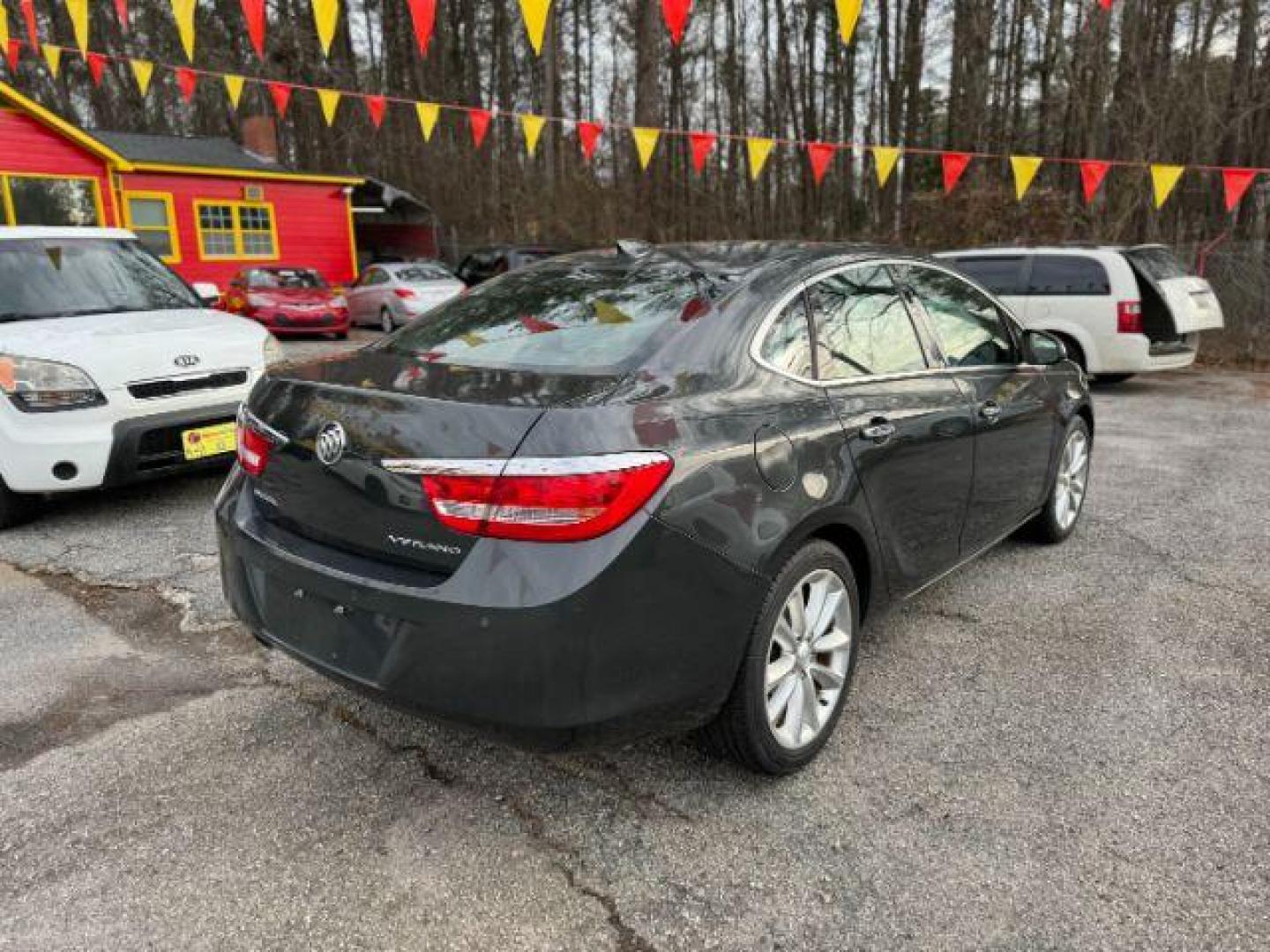 2015 Gray Buick Verano Leather (1G4PS5SK9F4) with an 2.4L L4 DOHC 16V FFV engine, 6-Speed Automatic transmission, located at 1806 Veterans Memorial Hwy SW, Austell, GA, 30168, (770) 944-9558, 33.817959, -84.606987 - Photo#4