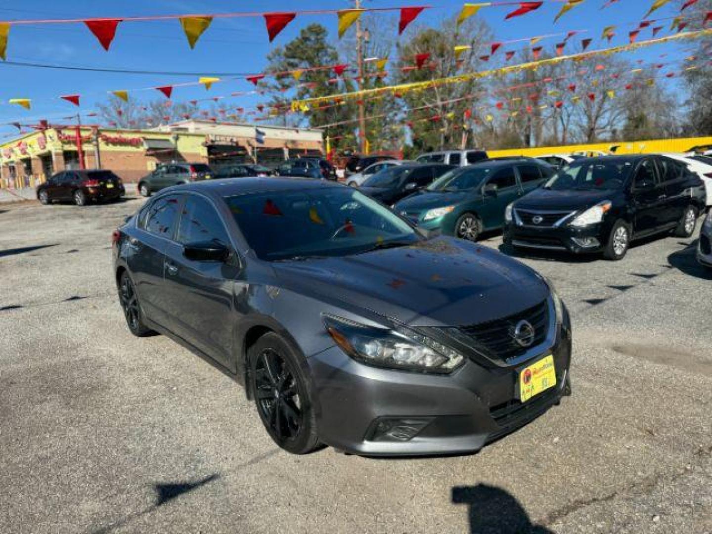 2017 Gray Nissan Altima 2.5 SR (1N4AL3AP7HC) with an 2.5L L4 DOHC 16V engine, Continuously Variable Transmission transmission, located at 1806 Veterans Memorial Hwy SW, Austell, GA, 30168, (770) 944-9558, 33.817959, -84.606987 - Photo#2