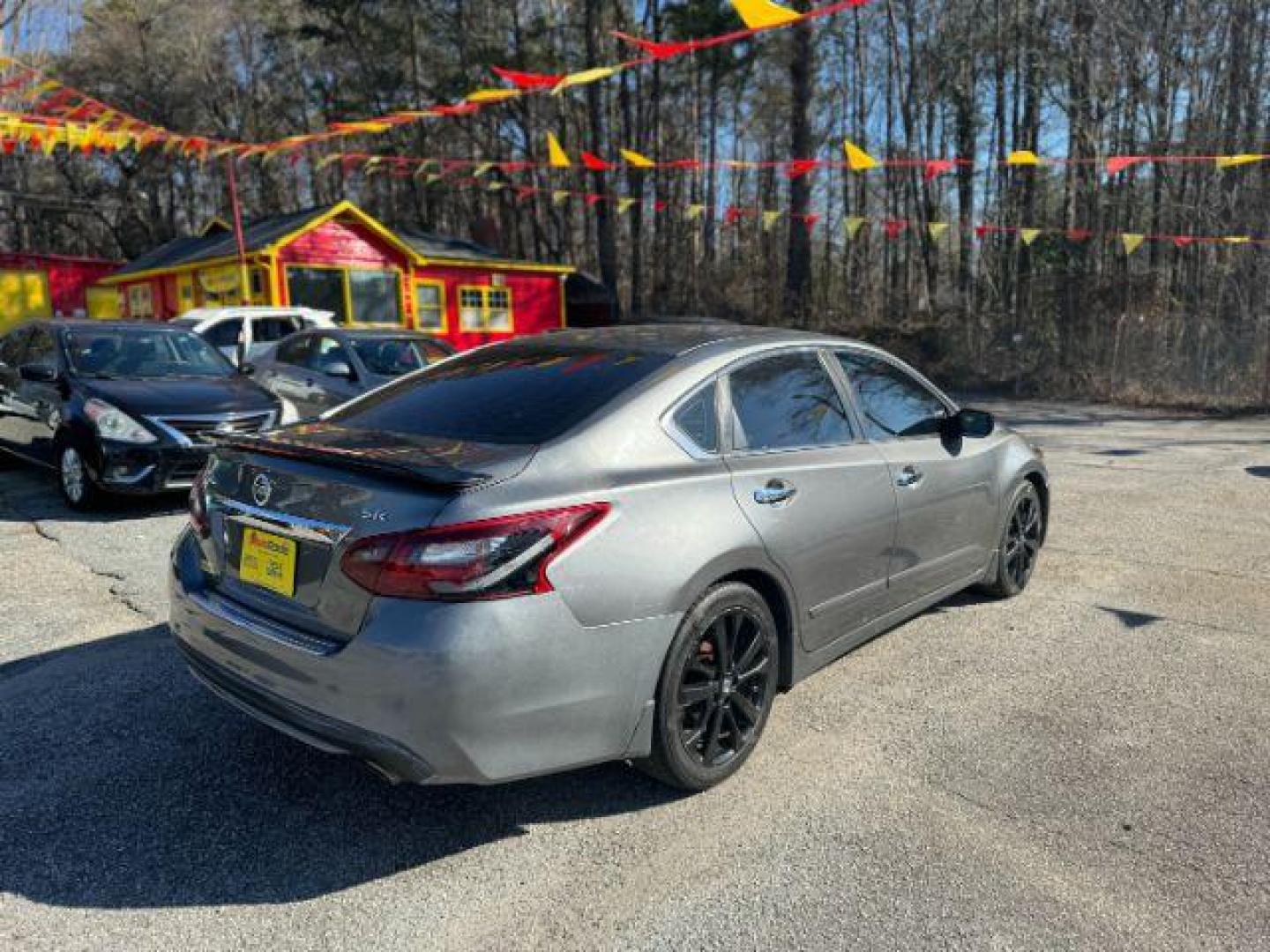 2017 Gray Nissan Altima 2.5 SR (1N4AL3AP7HC) with an 2.5L L4 DOHC 16V engine, Continuously Variable Transmission transmission, located at 1806 Veterans Memorial Hwy SW, Austell, GA, 30168, (770) 944-9558, 33.817959, -84.606987 - Photo#3