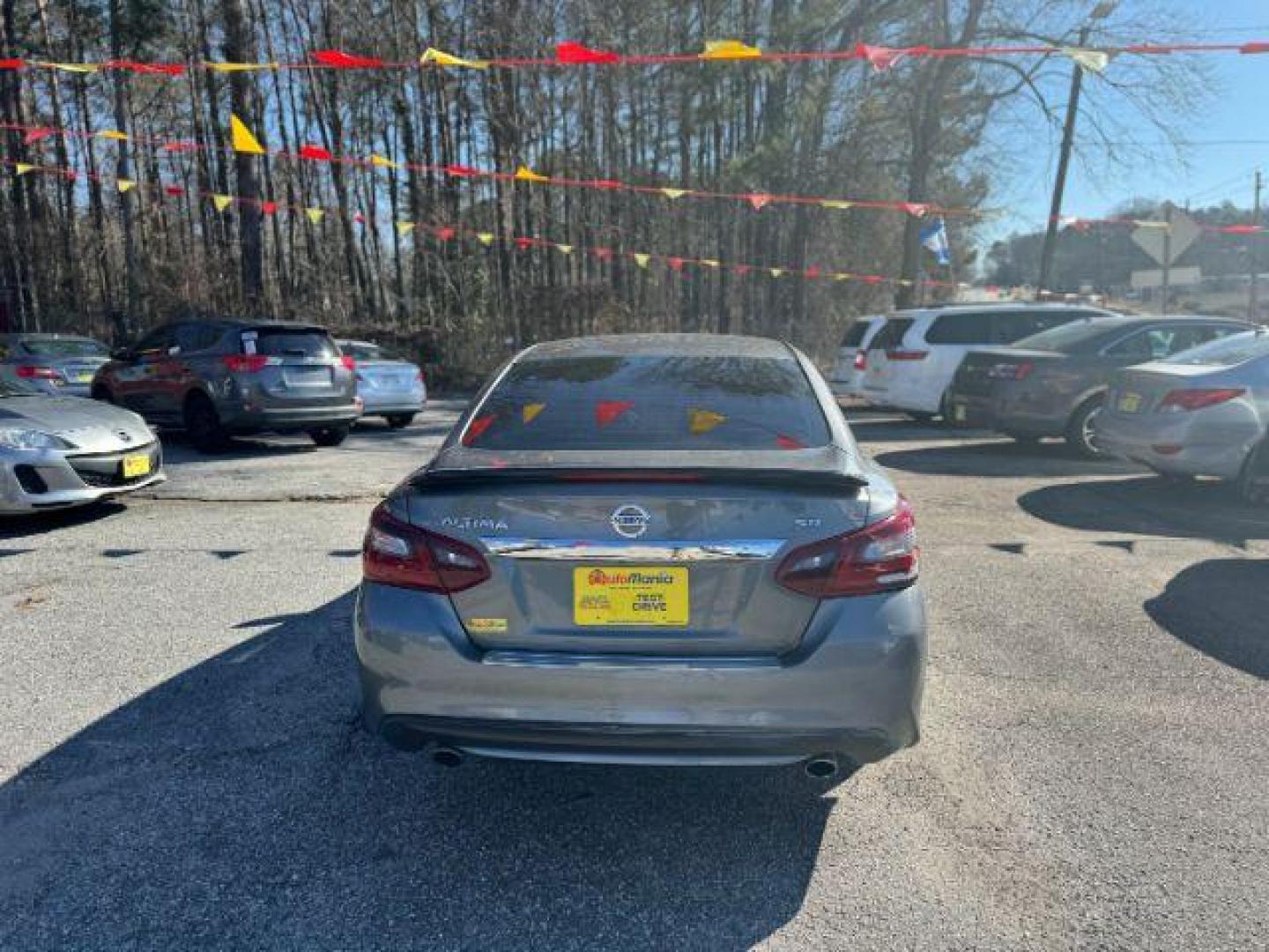 2017 Gray Nissan Altima 2.5 SR (1N4AL3AP7HC) with an 2.5L L4 DOHC 16V engine, Continuously Variable Transmission transmission, located at 1806 Veterans Memorial Hwy SW, Austell, GA, 30168, (770) 944-9558, 33.817959, -84.606987 - Photo#4