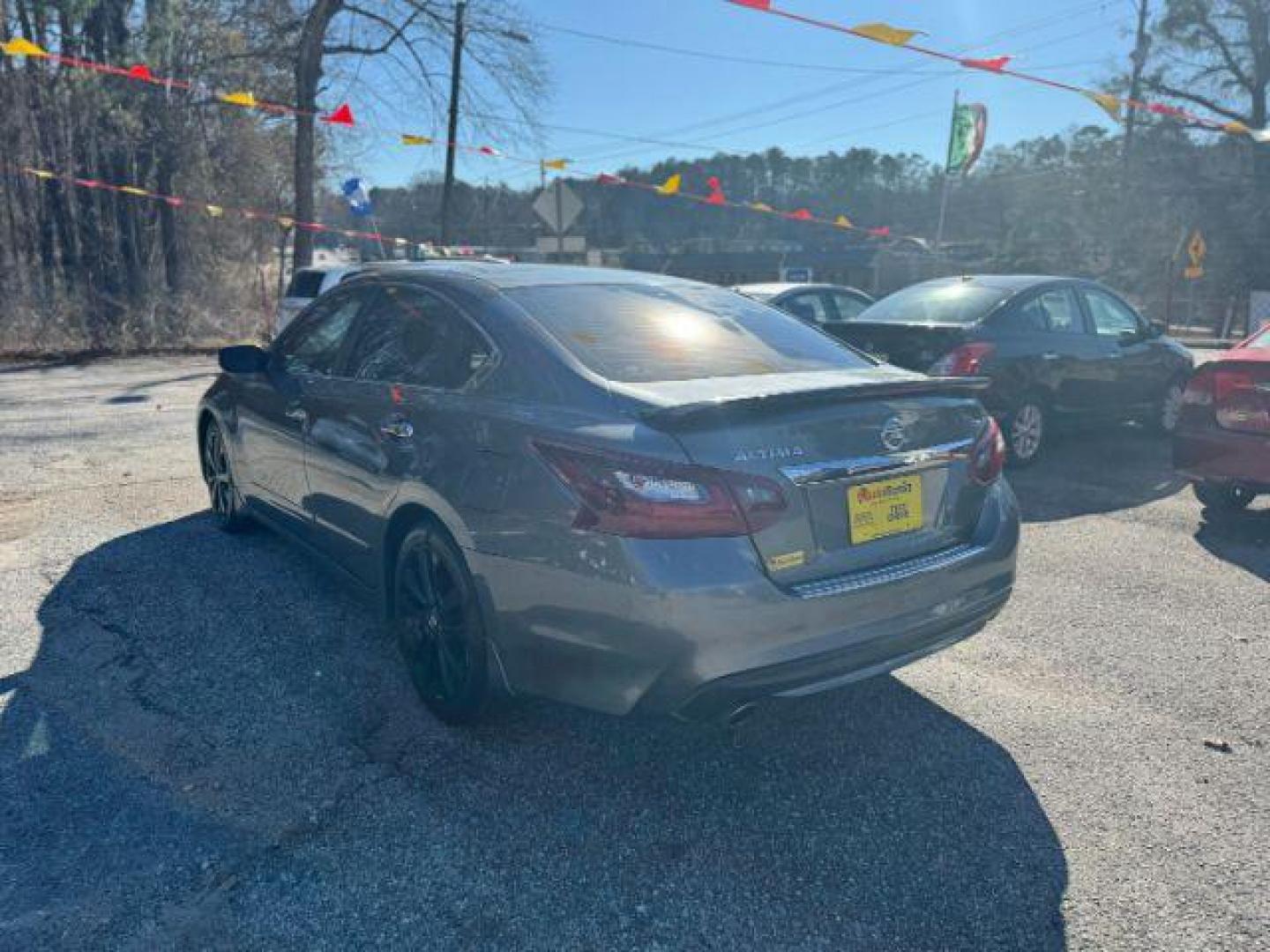 2017 Gray Nissan Altima 2.5 SR (1N4AL3AP7HC) with an 2.5L L4 DOHC 16V engine, Continuously Variable Transmission transmission, located at 1806 Veterans Memorial Hwy SW, Austell, GA, 30168, (770) 944-9558, 33.817959, -84.606987 - Photo#5