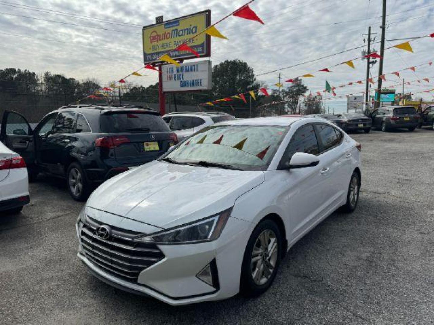 2019 White Hyundai Elantra Limited (5NPD84LF7KH) with an 1.8L L4 DOHC 16V engine, 6-Speed Automatic transmission, located at 1806 Veterans Memorial Hwy SW, Austell, GA, 30168, (770) 944-9558, 33.817959, -84.606987 - Photo#0