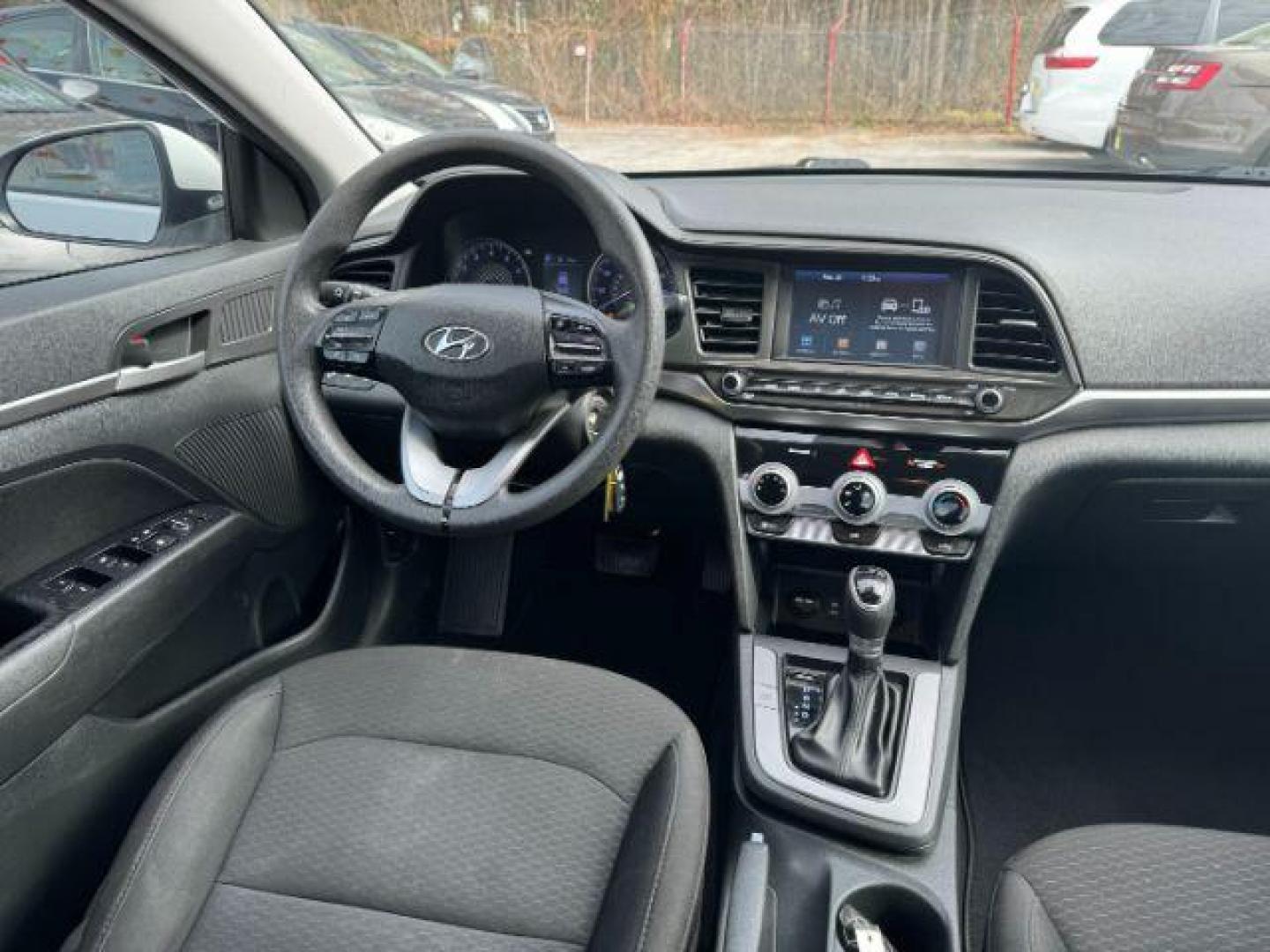 2019 White Hyundai Elantra Limited (5NPD84LF7KH) with an 1.8L L4 DOHC 16V engine, 6-Speed Automatic transmission, located at 1806 Veterans Memorial Hwy SW, Austell, GA, 30168, (770) 944-9558, 33.817959, -84.606987 - Photo#12