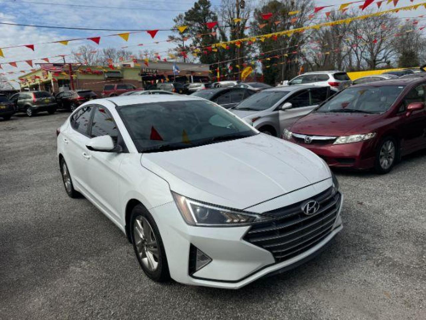 2019 White Hyundai Elantra Limited (5NPD84LF7KH) with an 1.8L L4 DOHC 16V engine, 6-Speed Automatic transmission, located at 1806 Veterans Memorial Hwy SW, Austell, GA, 30168, (770) 944-9558, 33.817959, -84.606987 - Photo#2