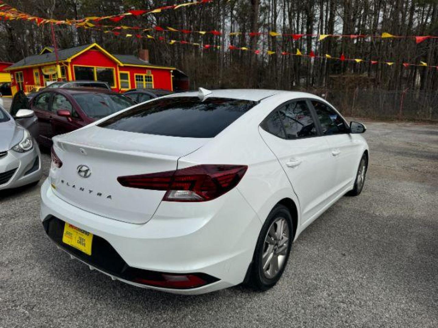 2019 White Hyundai Elantra Limited (5NPD84LF7KH) with an 1.8L L4 DOHC 16V engine, 6-Speed Automatic transmission, located at 1806 Veterans Memorial Hwy SW, Austell, GA, 30168, (770) 944-9558, 33.817959, -84.606987 - Photo#3