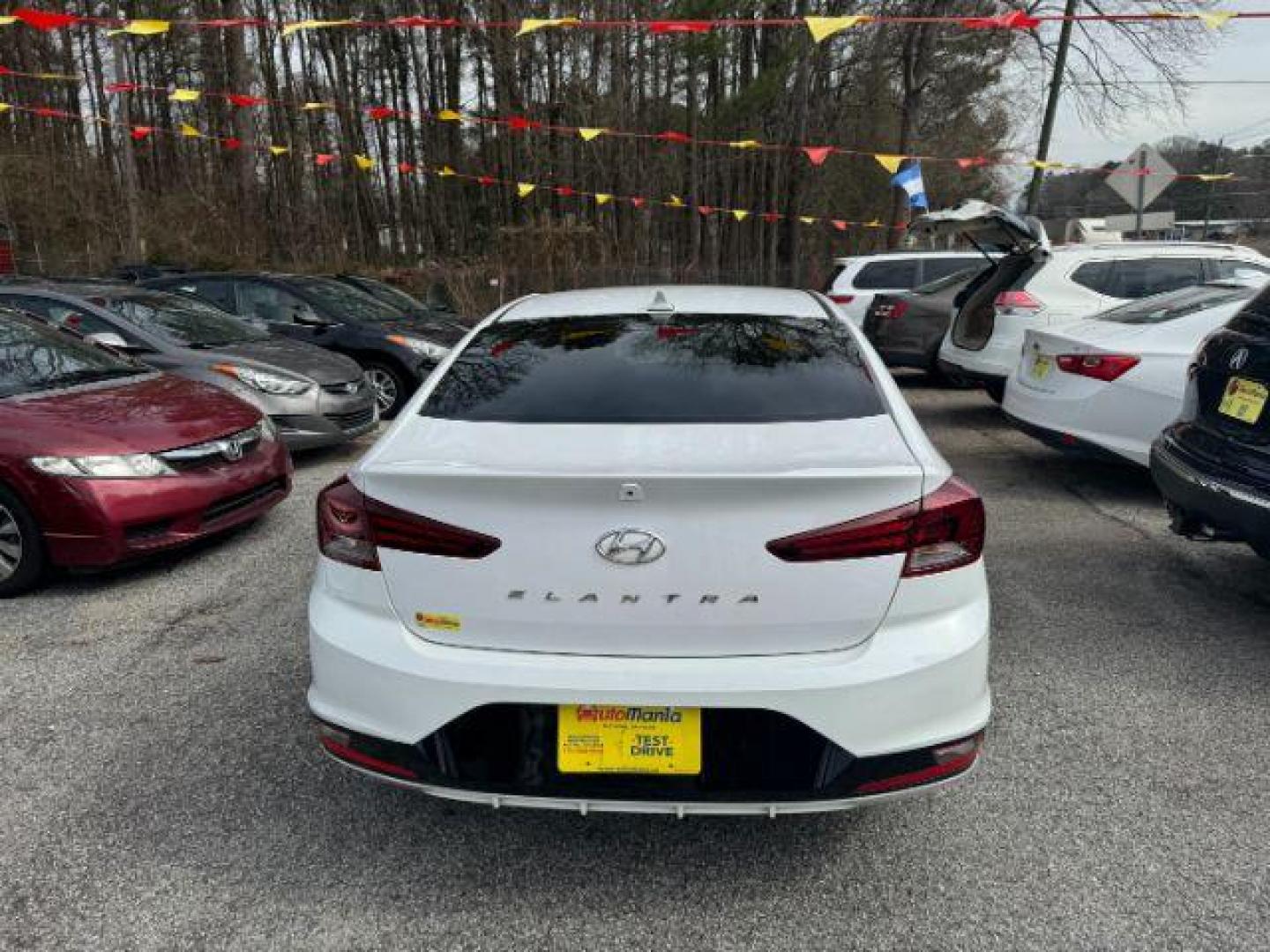 2019 White Hyundai Elantra Limited (5NPD84LF7KH) with an 1.8L L4 DOHC 16V engine, 6-Speed Automatic transmission, located at 1806 Veterans Memorial Hwy SW, Austell, GA, 30168, (770) 944-9558, 33.817959, -84.606987 - Photo#4