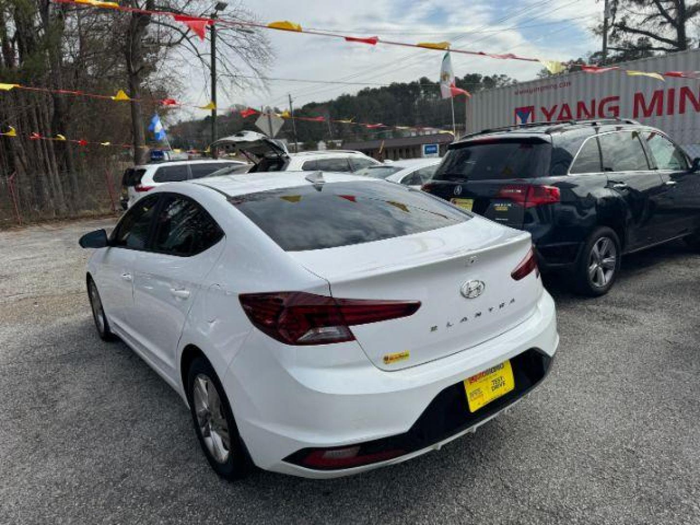 2019 White Hyundai Elantra Limited (5NPD84LF7KH) with an 1.8L L4 DOHC 16V engine, 6-Speed Automatic transmission, located at 1806 Veterans Memorial Hwy SW, Austell, GA, 30168, (770) 944-9558, 33.817959, -84.606987 - Photo#5