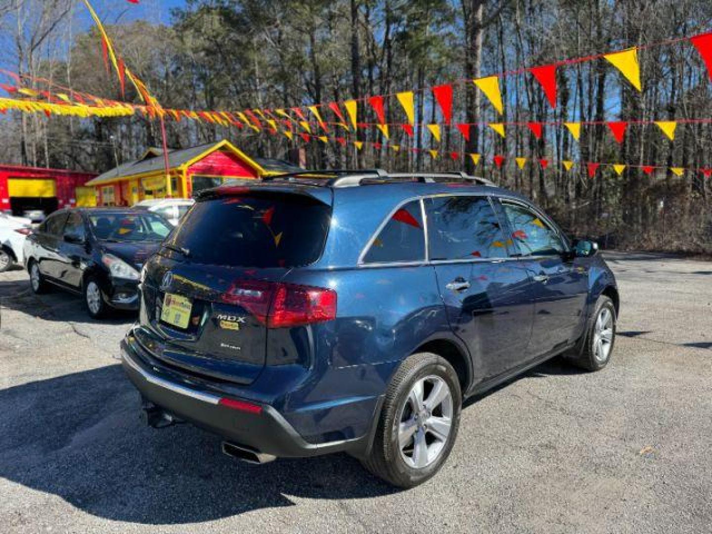 2013 Blue Acura MDX 6-Spd AT w/Tech Package (2HNYD2H37DH) with an 3.7L V6 SOHC 24V engine, 6-Speed Automatic transmission, located at 1806 Veterans Memorial Hwy SW, Austell, GA, 30168, (770) 944-9558, 33.817959, -84.606987 - Photo#4