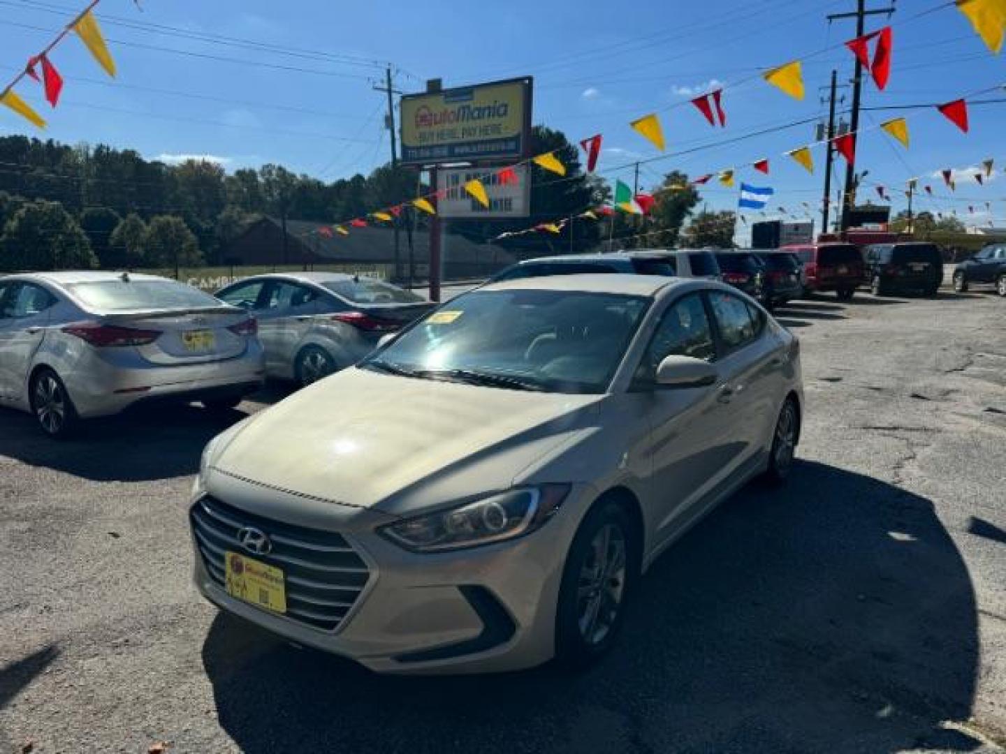 2017 Beige Hyundai Elantra Limited (KMHD84LF2HU) with an 1.8L L4 DOHC 16V engine, 6-Speed Automatic transmission, located at 1806 Veterans Memorial Hwy SW, Austell, GA, 30168, (770) 944-9558, 33.817959, -84.606987 - Photo#2