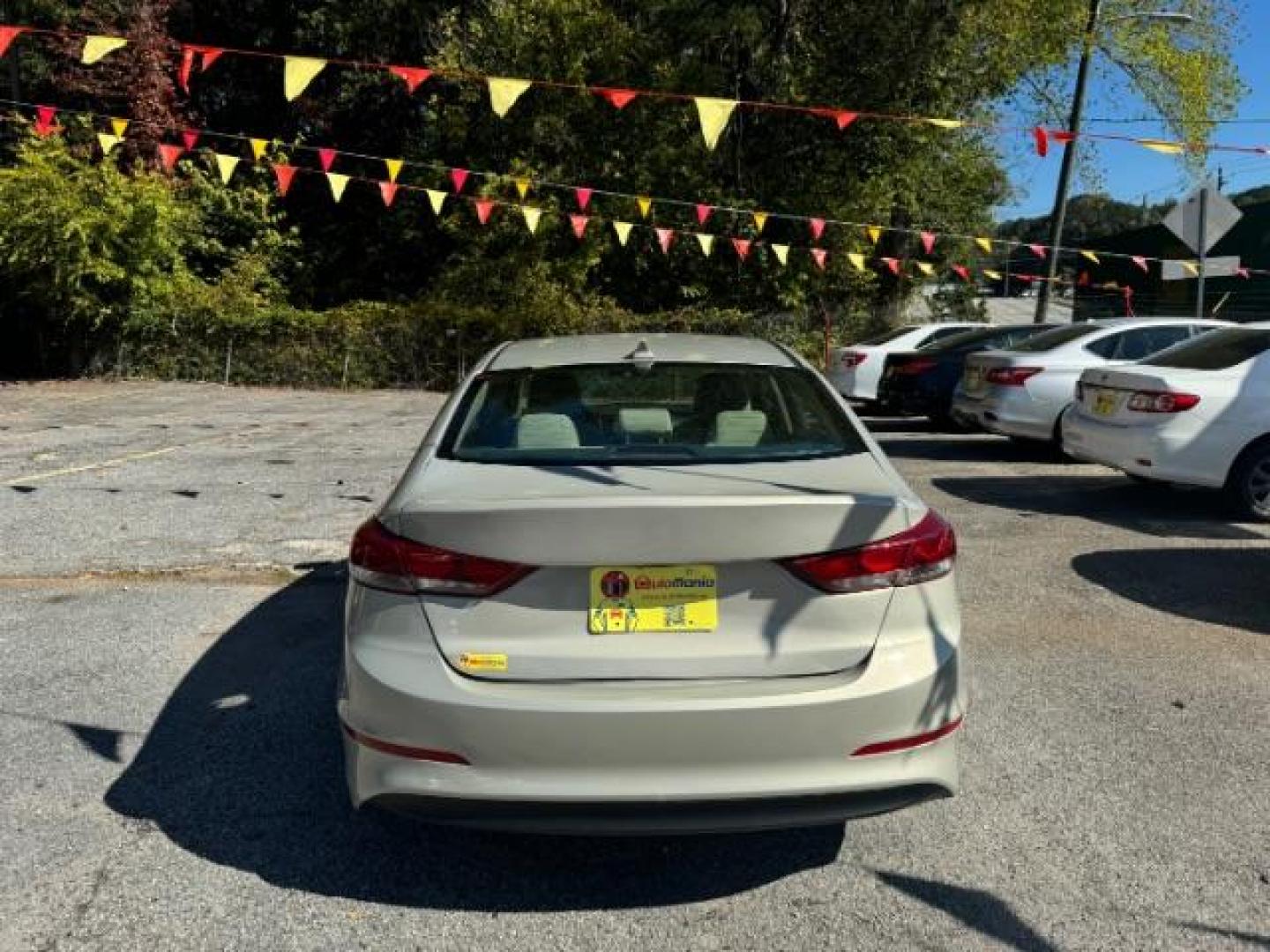 2017 Beige Hyundai Elantra Limited (KMHD84LF2HU) with an 1.8L L4 DOHC 16V engine, 6-Speed Automatic transmission, located at 1806 Veterans Memorial Hwy SW, Austell, GA, 30168, (770) 944-9558, 33.817959, -84.606987 - Photo#4