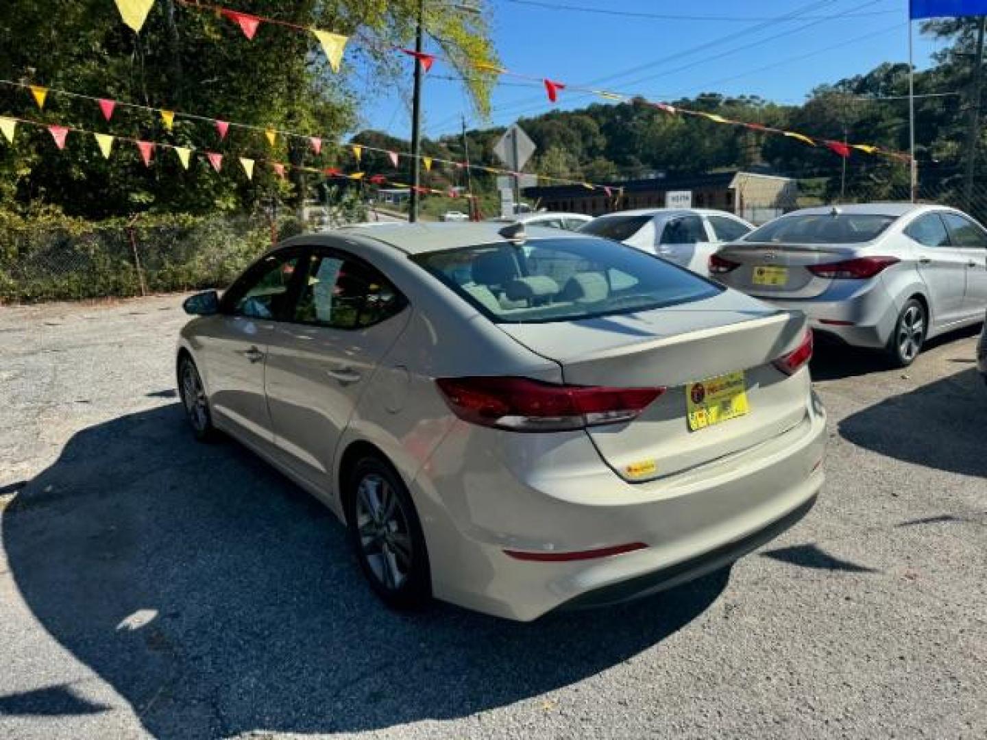 2017 Beige Hyundai Elantra Limited (KMHD84LF2HU) with an 1.8L L4 DOHC 16V engine, 6-Speed Automatic transmission, located at 1806 Veterans Memorial Hwy SW, Austell, GA, 30168, (770) 944-9558, 33.817959, -84.606987 - Photo#5