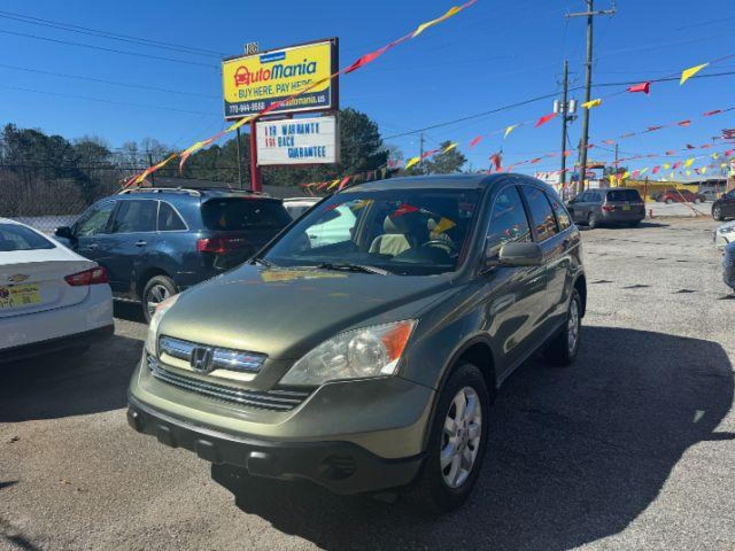 2009 Green Honda CR-V EX-L 2WD 5-Speed AT (5J6RE38779L) with an 2.4L L4 DOHC 16V engine, 5-Speed Automatic transmission, located at 1806 Veterans Memorial Hwy SW, Austell, GA, 30168, (770) 944-9558, 33.817959, -84.606987 - Photo#0