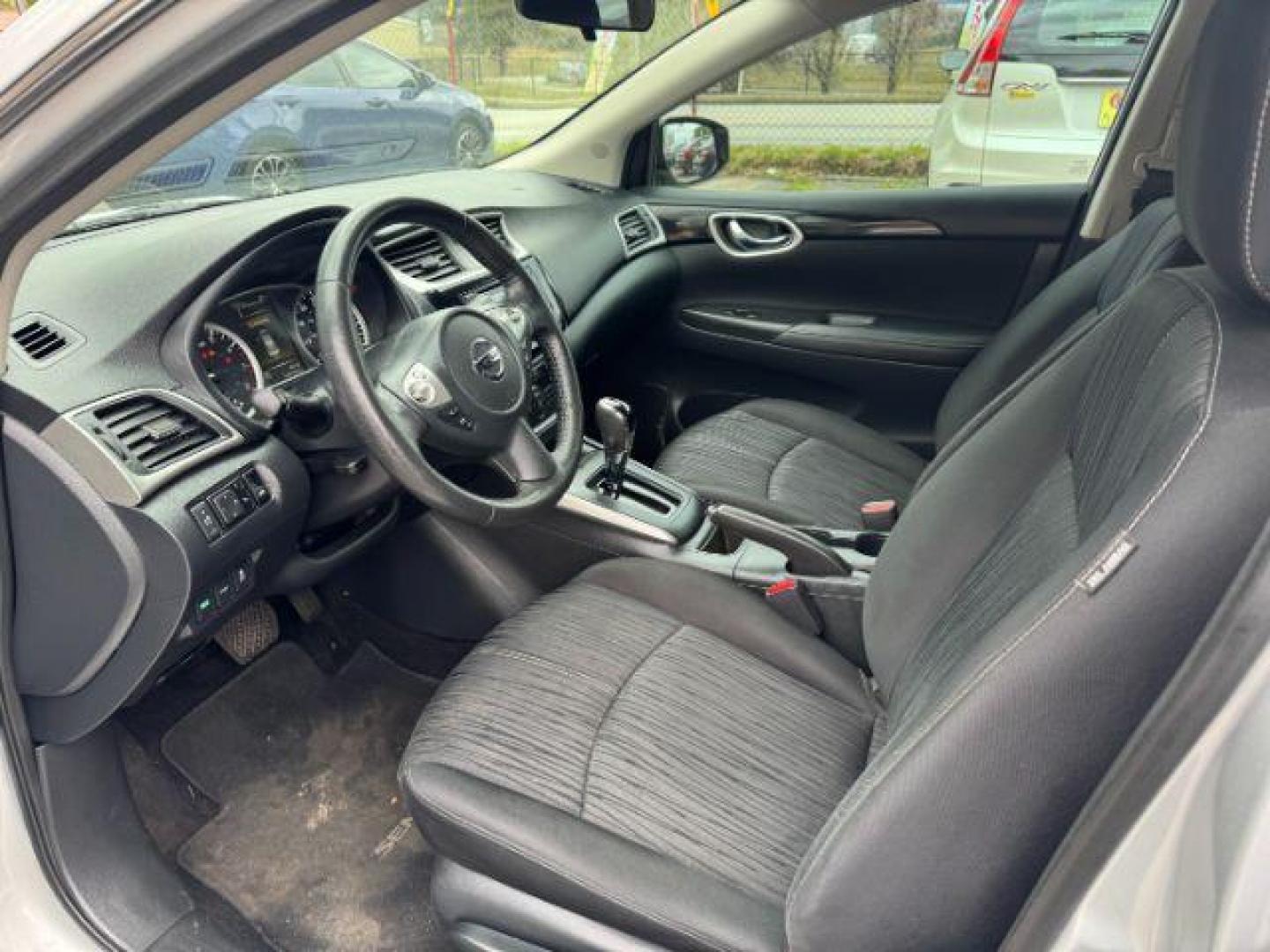 2018 Silver Nissan Sentra S CVT (3N1AB7AP0JL) with an 1.8L L4 SFI DOHC 16V engine, Continuously Variable Transmission transmission, located at 1806 Veterans Memorial Hwy SW, Austell, GA, 30168, (770) 944-9558, 33.817959, -84.606987 - Photo#5