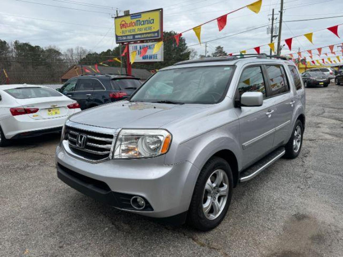 2014 Silver Honda Pilot EX-L 2WD 5-Spd AT with Navigation (5FNYF3H79EB) with an 3.5L V6 SOHC 24V engine, 5-Speed Automatic transmission, located at 1806 Veterans Memorial Hwy SW, Austell, GA, 30168, (770) 944-9558, 33.817959, -84.606987 - Photo#0