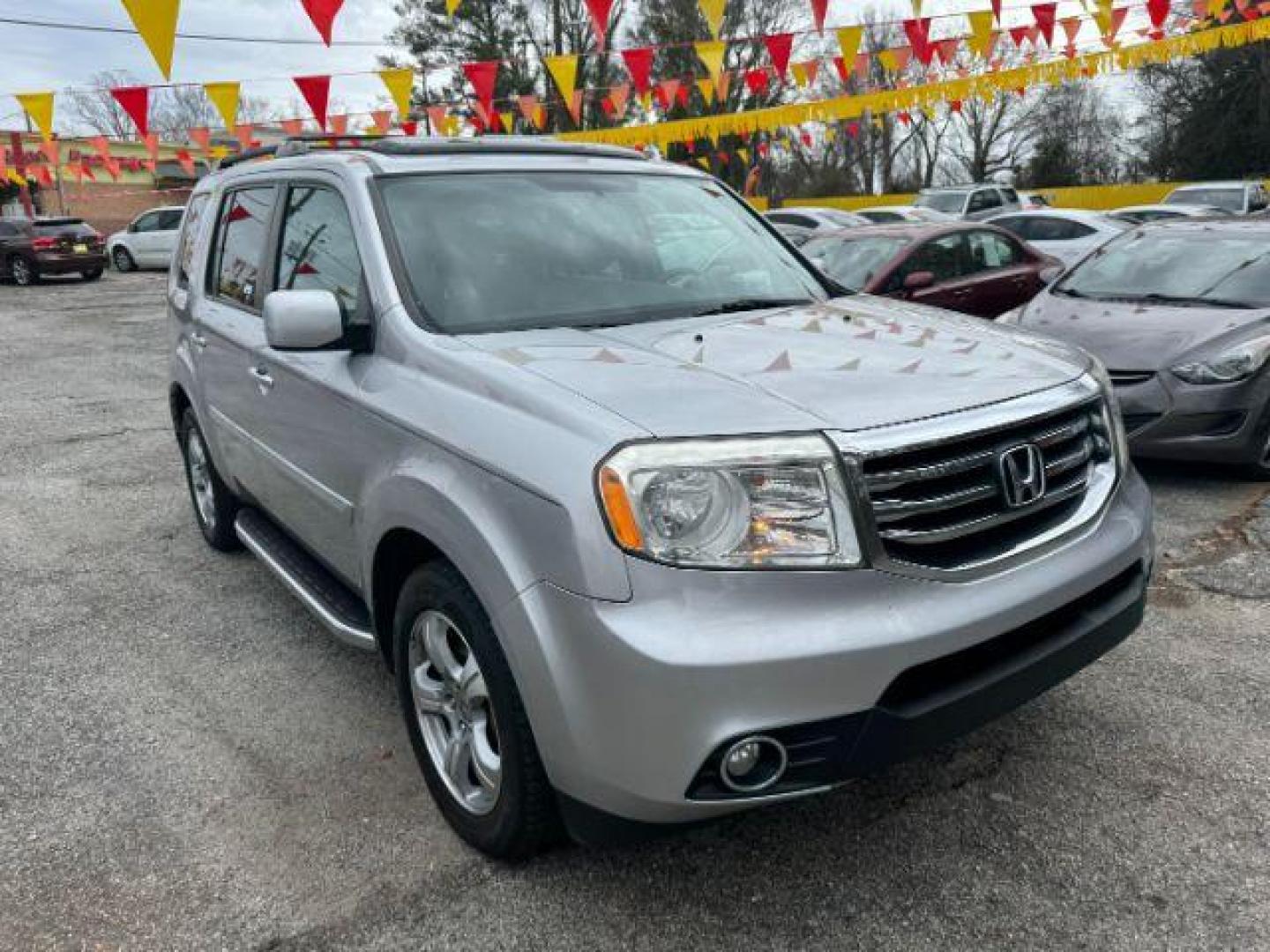 2014 Silver Honda Pilot EX-L 2WD 5-Spd AT with Navigation (5FNYF3H79EB) with an 3.5L V6 SOHC 24V engine, 5-Speed Automatic transmission, located at 1806 Veterans Memorial Hwy SW, Austell, GA, 30168, (770) 944-9558, 33.817959, -84.606987 - Photo#2