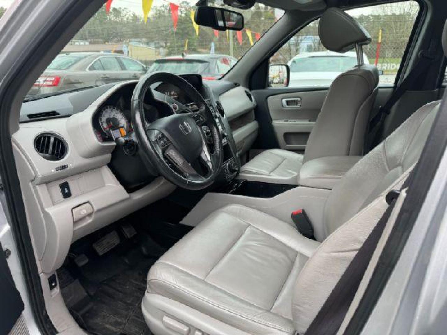 2014 Silver Honda Pilot EX-L 2WD 5-Spd AT with Navigation (5FNYF3H79EB) with an 3.5L V6 SOHC 24V engine, 5-Speed Automatic transmission, located at 1806 Veterans Memorial Hwy SW, Austell, GA, 30168, (770) 944-9558, 33.817959, -84.606987 - Photo#6