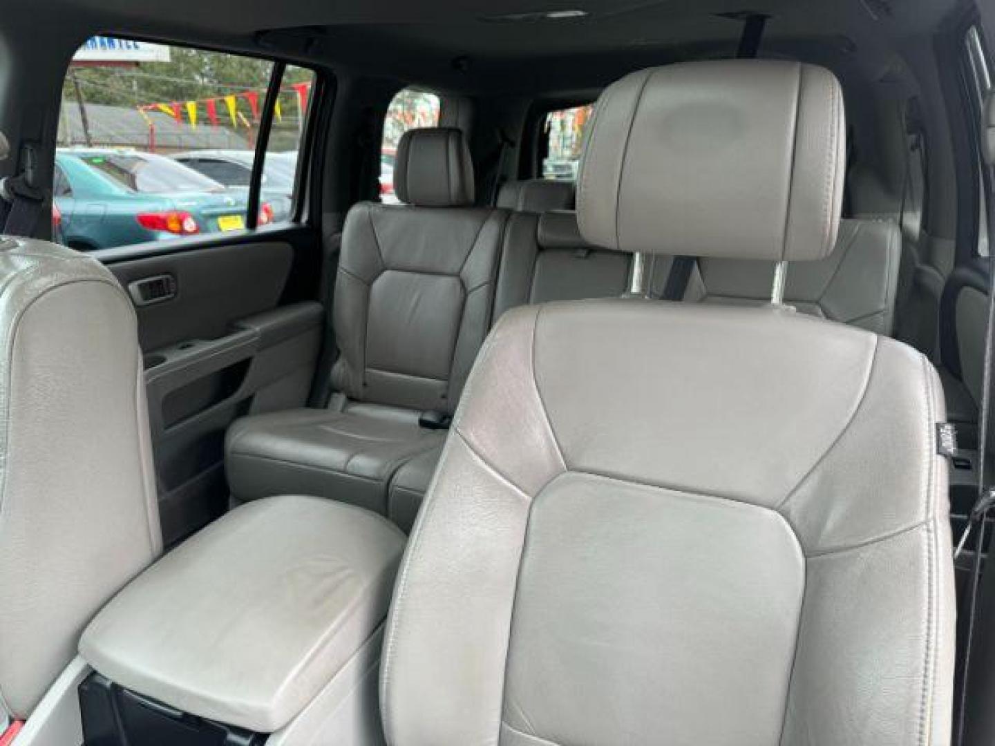 2014 Silver Honda Pilot EX-L 2WD 5-Spd AT with Navigation (5FNYF3H79EB) with an 3.5L V6 SOHC 24V engine, 5-Speed Automatic transmission, located at 1806 Veterans Memorial Hwy SW, Austell, GA, 30168, (770) 944-9558, 33.817959, -84.606987 - Photo#8