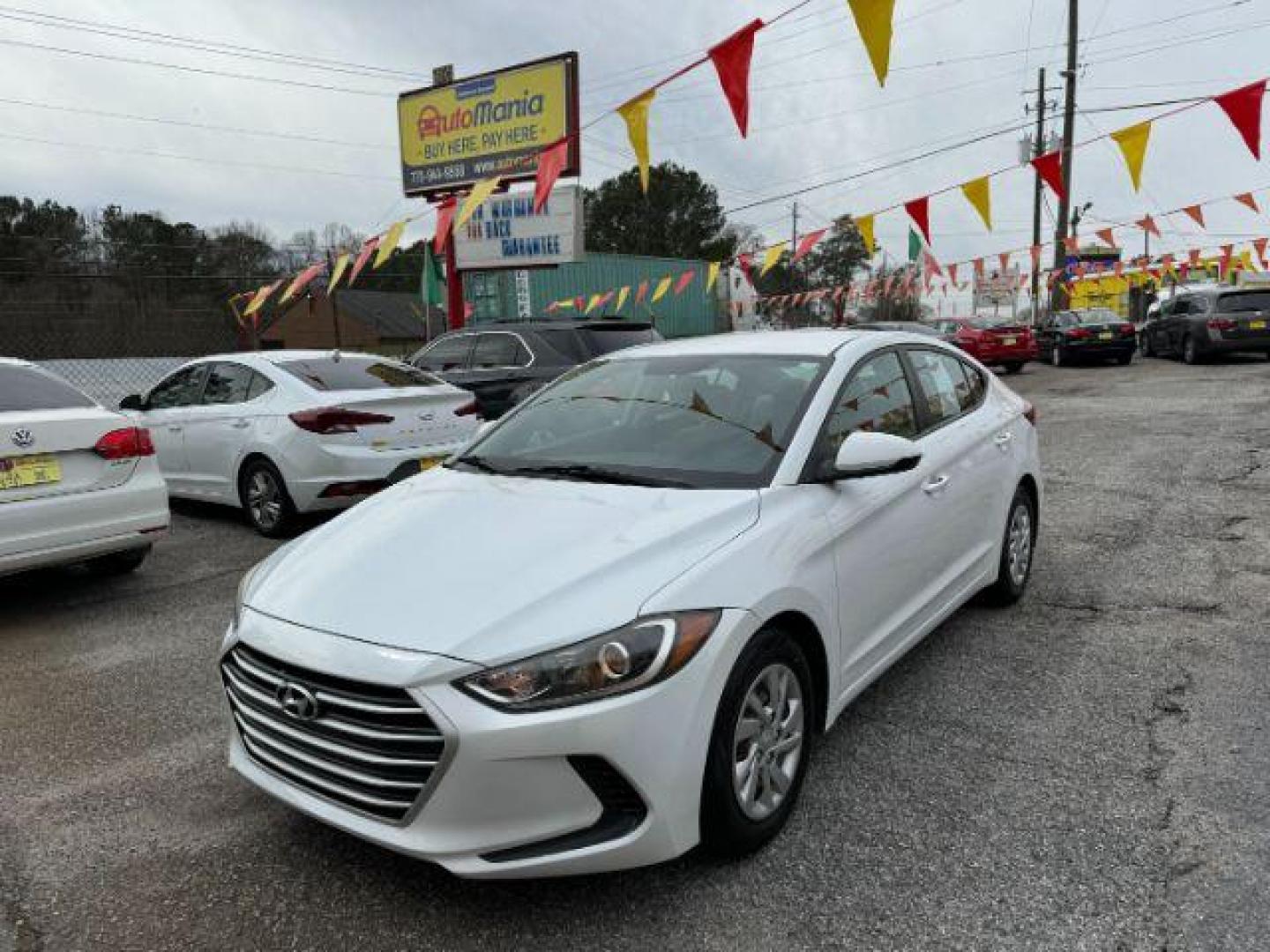 2017 White Hyundai Elantra SE 6AT (5NPD74LF3HH) with an 1.8L L4 DOHC 16V engine, 6-Speed Automatic transmission, located at 1806 Veterans Memorial Hwy SW, Austell, GA, 30168, (770) 944-9558, 33.817959, -84.606987 - Photo#0