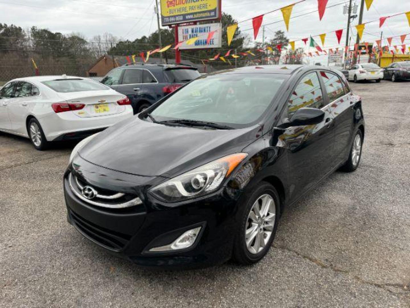 2013 Black Hyundai Elantra GT A/T (KMHD35LE3DU) with an 1.8L L4 16V DOHC engine, 6-Speed Automatic transmission, located at 1806 Veterans Memorial Hwy SW, Austell, GA, 30168, (770) 944-9558, 33.817959, -84.606987 - Photo#0