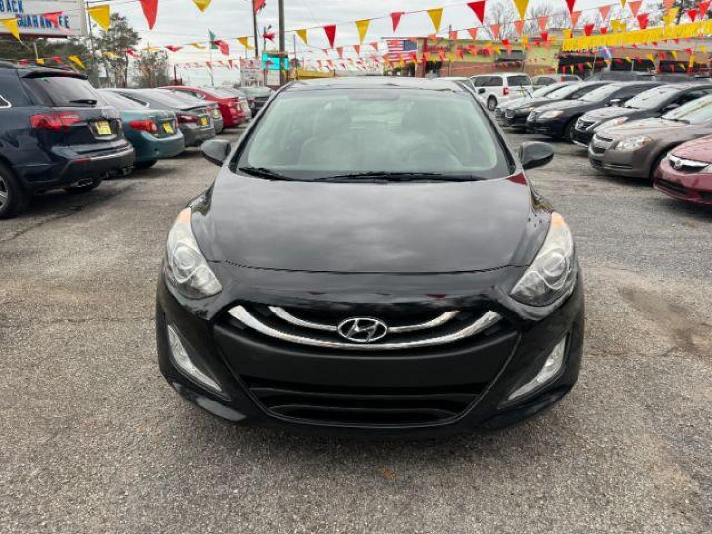 2013 Black Hyundai Elantra GT A/T (KMHD35LE3DU) with an 1.8L L4 16V DOHC engine, 6-Speed Automatic transmission, located at 1806 Veterans Memorial Hwy SW, Austell, GA, 30168, (770) 944-9558, 33.817959, -84.606987 - Photo#1