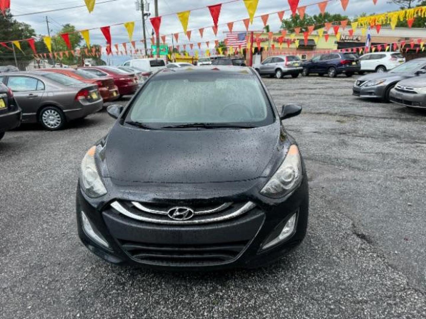 2013 Black Hyundai Elantra GT A/T (KMHD35LE3DU) with an 1.8L L4 16V DOHC engine, 6-Speed Automatic transmission, located at 1806 Veterans Memorial Hwy SW, Austell, GA, 30168, (770) 944-9558, 33.817959, -84.606987 - Photo#20