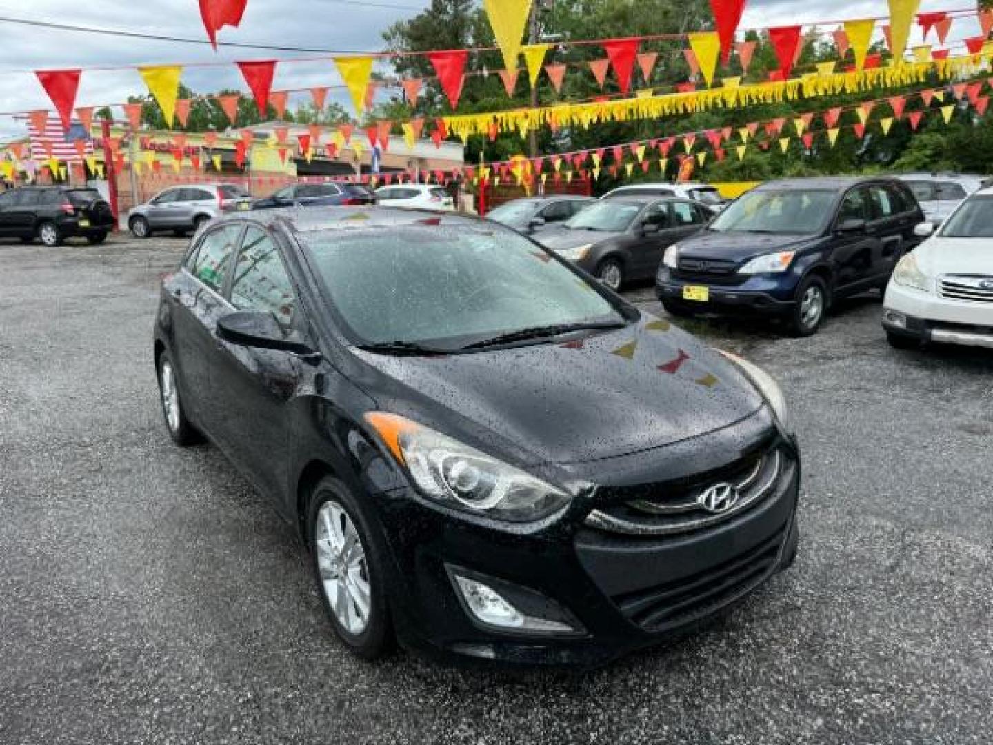 2013 Black Hyundai Elantra GT A/T (KMHD35LE3DU) with an 1.8L L4 16V DOHC engine, 6-Speed Automatic transmission, located at 1806 Veterans Memorial Hwy SW, Austell, GA, 30168, (770) 944-9558, 33.817959, -84.606987 - Photo#21