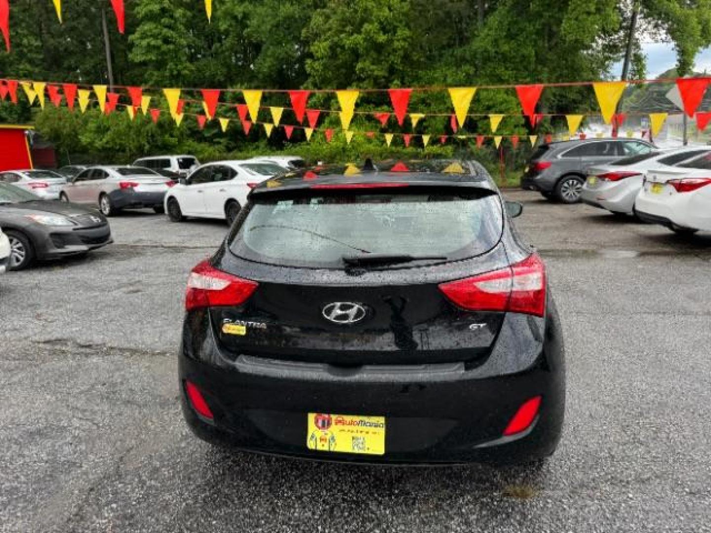 2013 Black Hyundai Elantra GT A/T (KMHD35LE3DU) with an 1.8L L4 16V DOHC engine, 6-Speed Automatic transmission, located at 1806 Veterans Memorial Hwy SW, Austell, GA, 30168, (770) 944-9558, 33.817959, -84.606987 - Photo#23