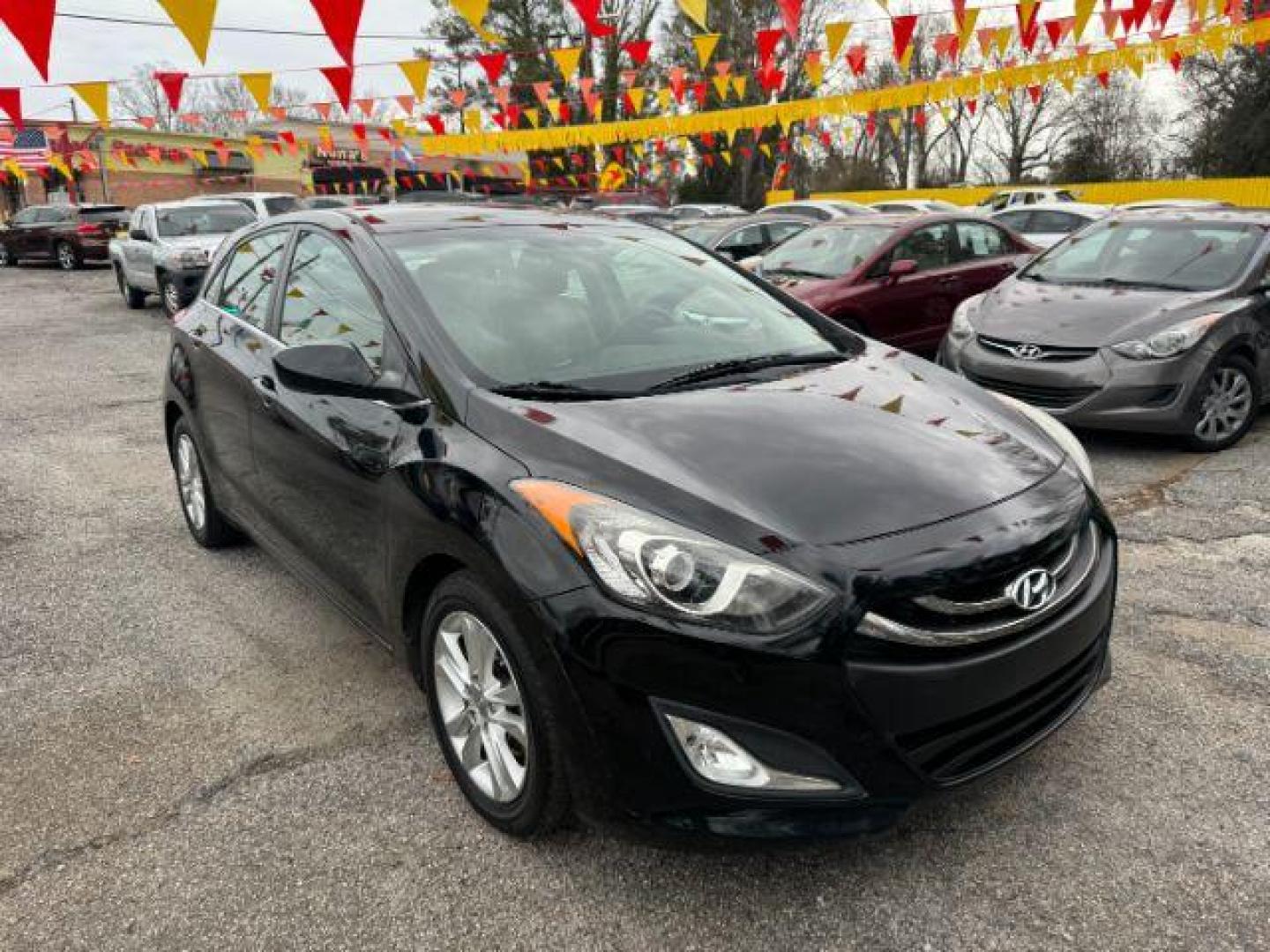 2013 Black Hyundai Elantra GT A/T (KMHD35LE3DU) with an 1.8L L4 16V DOHC engine, 6-Speed Automatic transmission, located at 1806 Veterans Memorial Hwy SW, Austell, GA, 30168, (770) 944-9558, 33.817959, -84.606987 - Photo#2