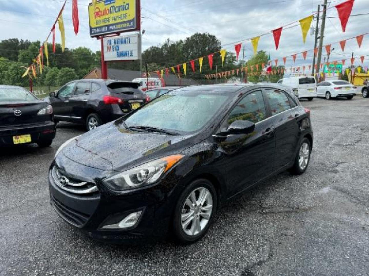 2013 Black Hyundai Elantra GT A/T (KMHD35LE3DU) with an 1.8L L4 16V DOHC engine, 6-Speed Automatic transmission, located at 1806 Veterans Memorial Hwy SW, Austell, GA, 30168, (770) 944-9558, 33.817959, -84.606987 - Photo#19