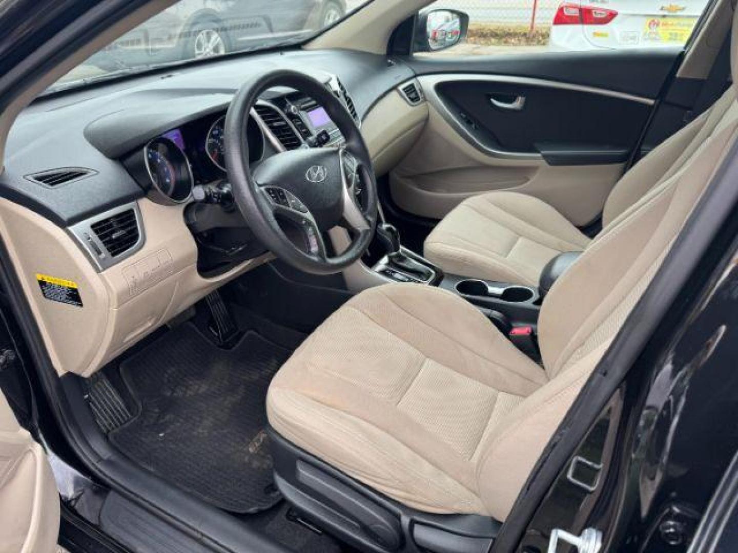 2013 Black Hyundai Elantra GT A/T (KMHD35LE3DU) with an 1.8L L4 16V DOHC engine, 6-Speed Automatic transmission, located at 1806 Veterans Memorial Hwy SW, Austell, GA, 30168, (770) 944-9558, 33.817959, -84.606987 - Photo#6