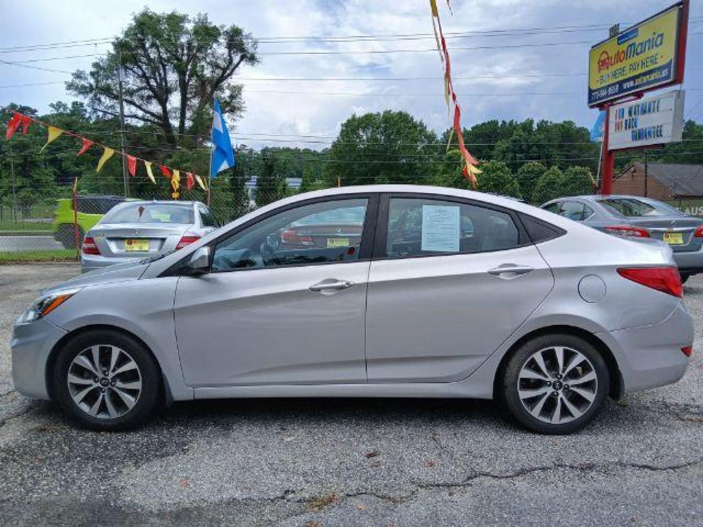 2017 Silver Hyundai Accent SE 4-Door 6A (KMHCT4AEXHU) with an 1.6L L4 DOHC 16V engine, 6-Speed Automatic transmission, located at 1806 Veterans Memorial Hwy SW, Austell, GA, 30168, (770) 944-9558, 33.817959, -84.606987 - Photo#3