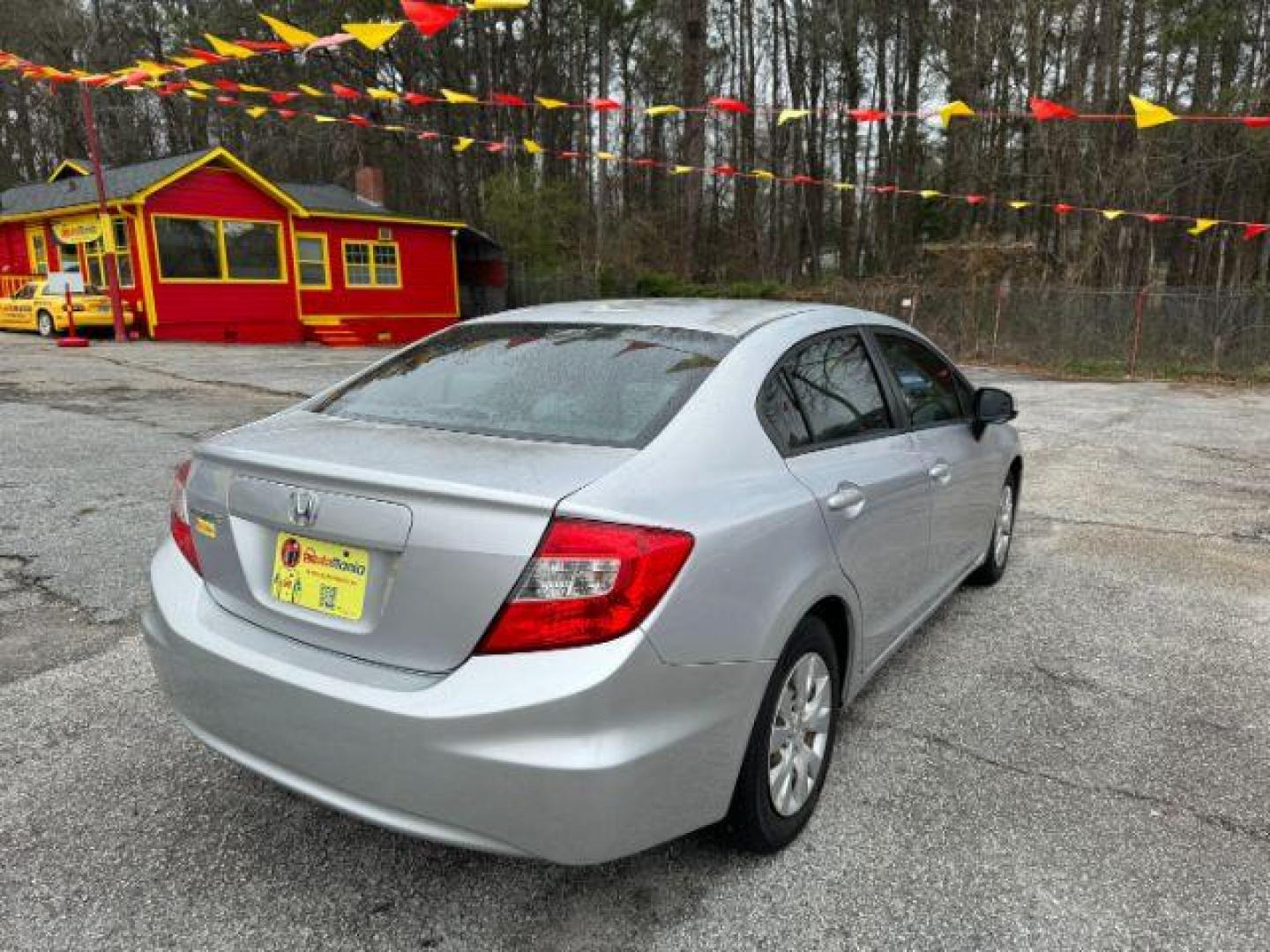 2012 Silver Honda Civic LX Sedan 5-Speed AT (2HGFB2F55CH) with an 1.8L L4 SOHC 16V engine, 5-Speed Automatic transmission, located at 1806 Veterans Memorial Hwy SW, Austell, GA, 30168, (770) 944-9558, 33.817959, -84.606987 - Photo#3