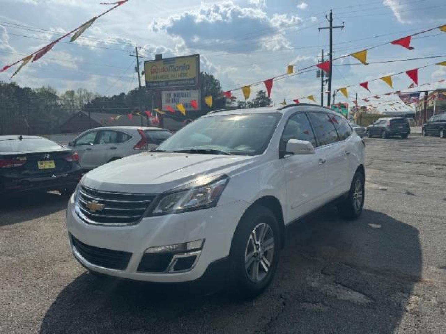 2016 White Chevrolet Traverse 2LT FWD (1GNKRHKD2GJ) with an 3.6L V6 DOHC 24V engine, 6-Speed Automatic transmission, located at 1806 Veterans Memorial Hwy SW, Austell, GA, 30168, (770) 944-9558, 33.817959, -84.606987 - Photo#0