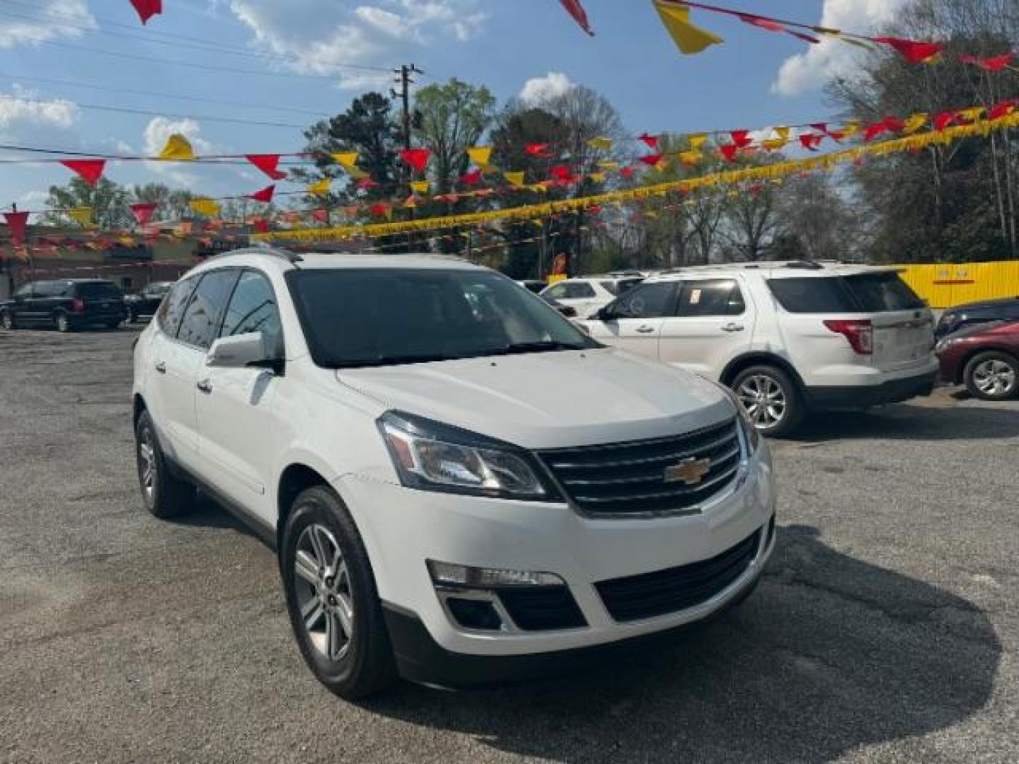 2016 White Chevrolet Traverse 2LT FWD (1GNKRHKD2GJ) with an 3.6L V6 DOHC 24V engine, 6-Speed Automatic transmission, located at 1806 Veterans Memorial Hwy SW, Austell, GA, 30168, (770) 944-9558, 33.817959, -84.606987 - Photo#2