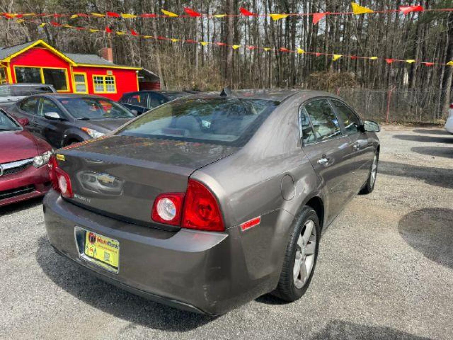 2012 Brown Chevrolet Malibu 1LT (1G1ZC5E08CF) with an 2.4L L4 DOHC 16V engine, 6-Speed Automatic transmission, located at 1806 Veterans Memorial Hwy SW, Austell, GA, 30168, (770) 944-9558, 33.817959, -84.606987 - Photo#3