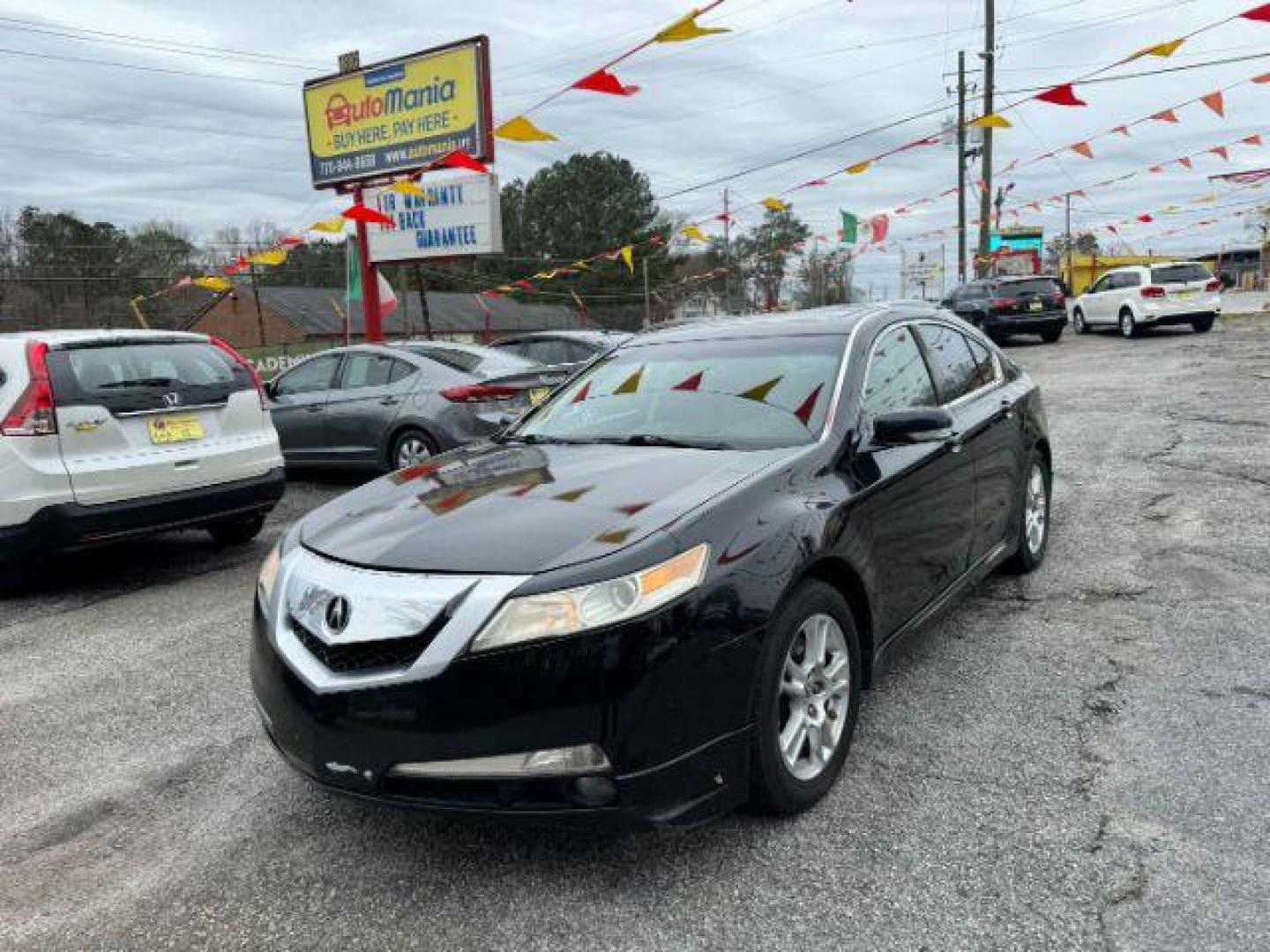 2009 Black Acura TL 5-Speed AT (19UUA86239A) with an 3.5L V6 SOHC 24V engine, 5-Speed Automatic transmission, located at 1806 Veterans Memorial Hwy SW, Austell, GA, 30168, (770) 944-9558, 33.817959, -84.606987 - Photo#0