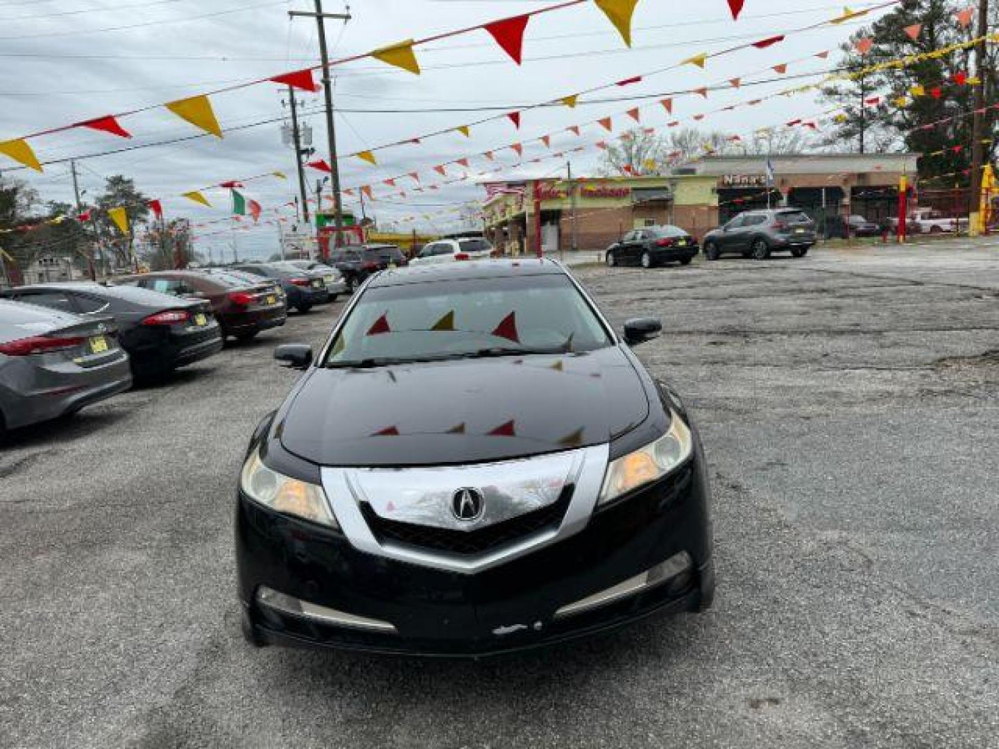 2009 Black Acura TL 5-Speed AT (19UUA86239A) with an 3.5L V6 SOHC 24V engine, 5-Speed Automatic transmission, located at 1806 Veterans Memorial Hwy SW, Austell, GA, 30168, (770) 944-9558, 33.817959, -84.606987 - Photo#1