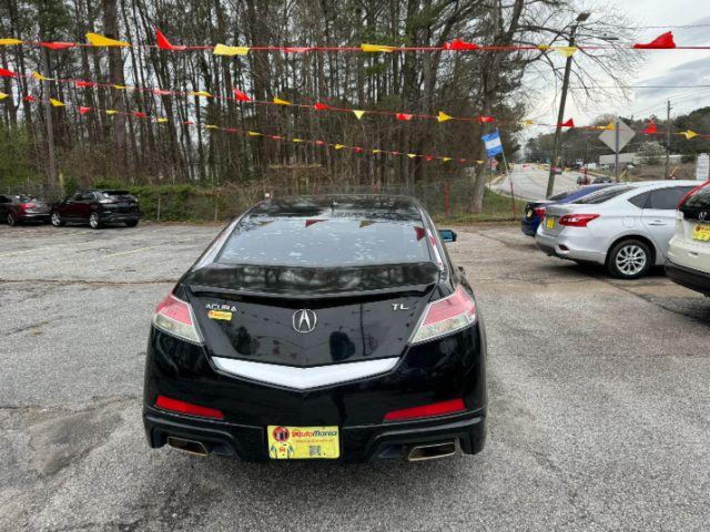 2009 Black Acura TL 5-Speed AT (19UUA86239A) with an 3.5L V6 SOHC 24V engine, 5-Speed Automatic transmission, located at 1806 Veterans Memorial Hwy SW, Austell, GA, 30168, (770) 944-9558, 33.817959, -84.606987 - Photo#4