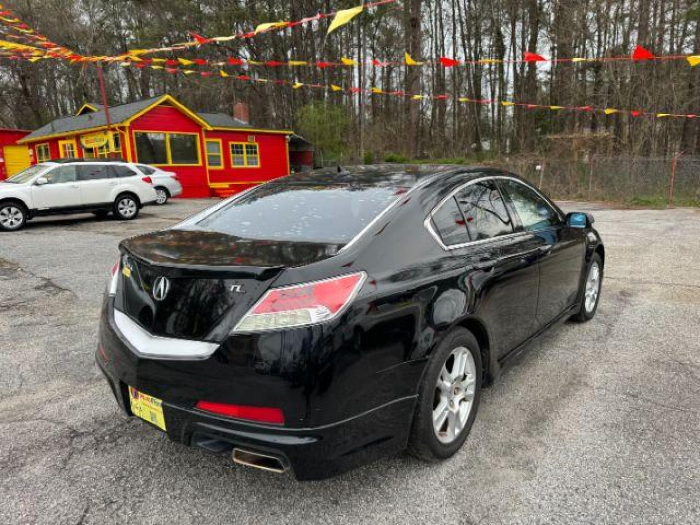 2009 Black Acura TL 5-Speed AT (19UUA86239A) with an 3.5L V6 SOHC 24V engine, 5-Speed Automatic transmission, located at 1806 Veterans Memorial Hwy SW, Austell, GA, 30168, (770) 944-9558, 33.817959, -84.606987 - Photo#3