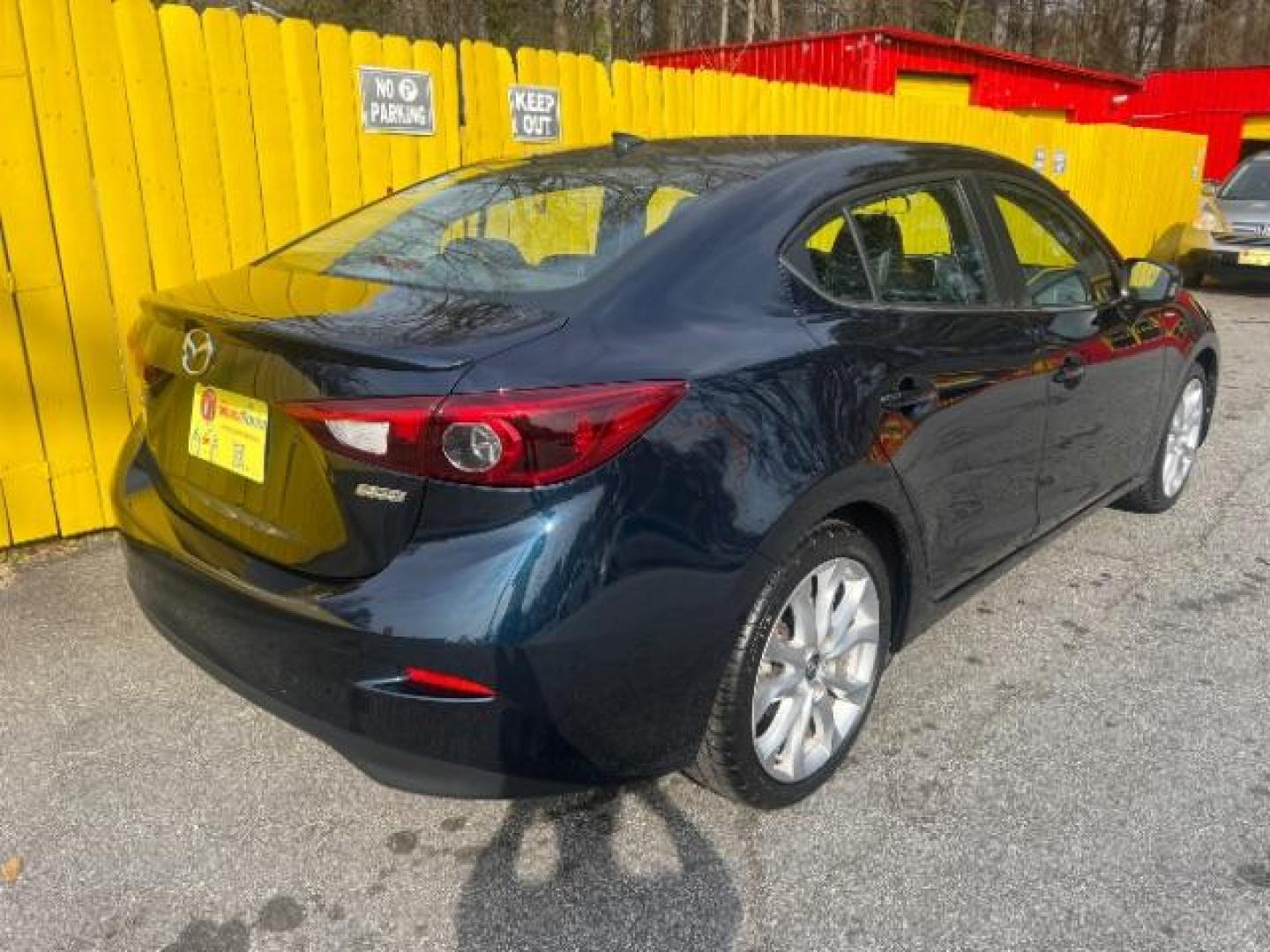 2014 Blue Mazda MAZDA3 s Touring AT 4-Door (JM1BM1V37E1) with an 2.5L L4 DOHC 16V engine, 6-Speed Automatic transmission, located at 1806 Veterans Memorial Hwy SW, Austell, GA, 30168, (770) 944-9558, 33.817959, -84.606987 - Photo#9