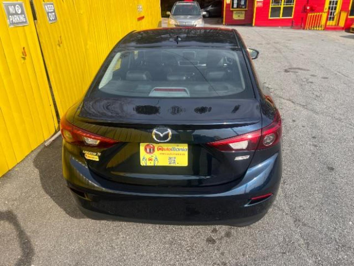 2014 Blue Mazda MAZDA3 s Touring AT 4-Door (JM1BM1V37E1) with an 2.5L L4 DOHC 16V engine, 6-Speed Automatic transmission, located at 1806 Veterans Memorial Hwy SW, Austell, GA, 30168, (770) 944-9558, 33.817959, -84.606987 - Photo#11