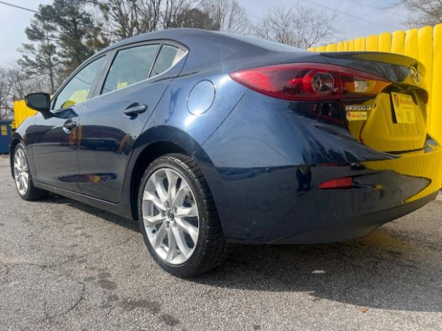 2014 Blue Mazda MAZDA3 s Touring AT 4-Door (JM1BM1V37E1) with an 2.5L L4 DOHC 16V engine, 6-Speed Automatic transmission, located at 1806 Veterans Memorial Hwy SW, Austell, GA, 30168, (770) 944-9558, 33.817959, -84.606987 - Photo#3