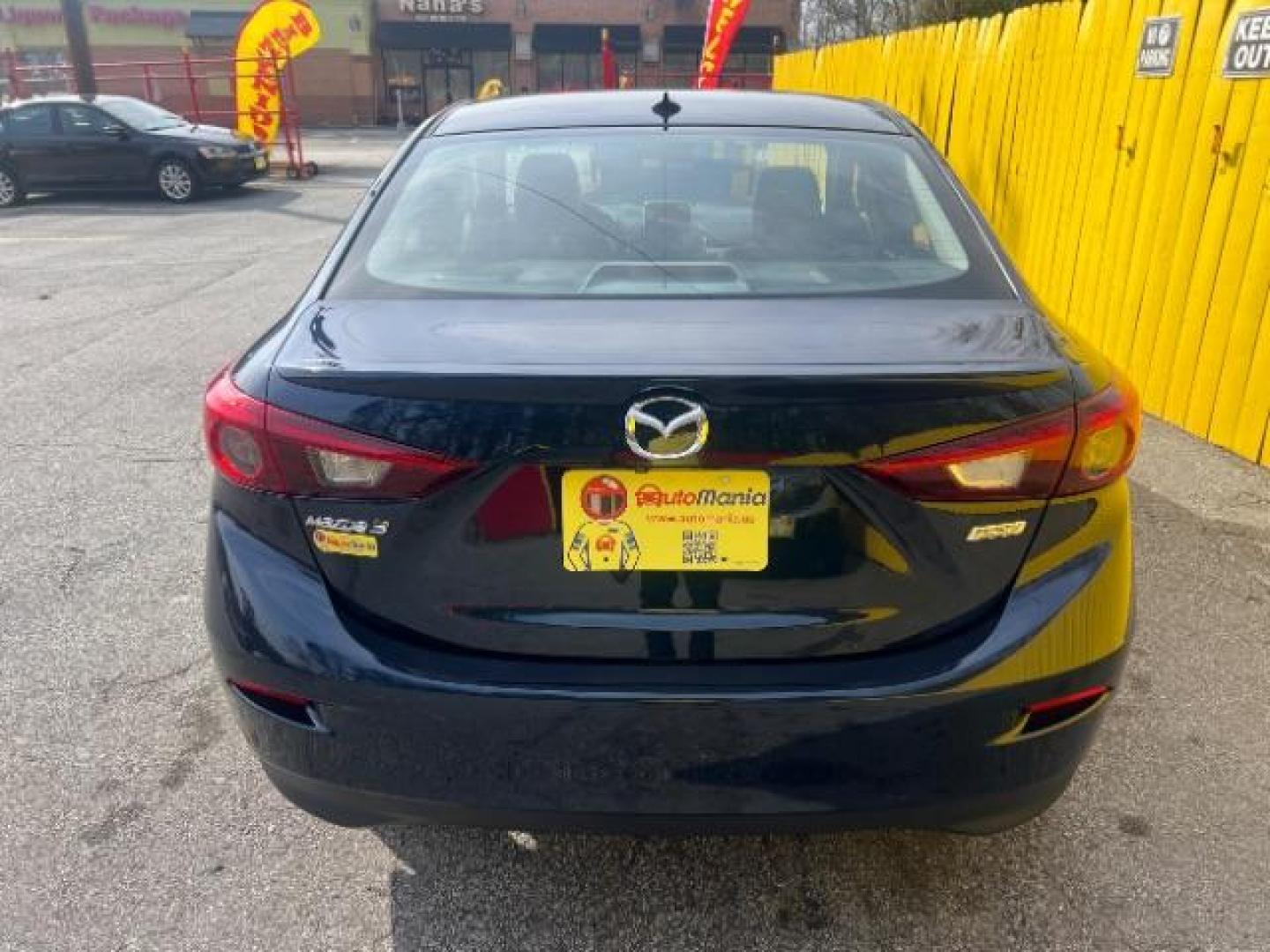 2014 Blue Mazda MAZDA3 s Touring AT 4-Door (JM1BM1V37E1) with an 2.5L L4 DOHC 16V engine, 6-Speed Automatic transmission, located at 1806 Veterans Memorial Hwy SW, Austell, GA, 30168, (770) 944-9558, 33.817959, -84.606987 - Photo#4