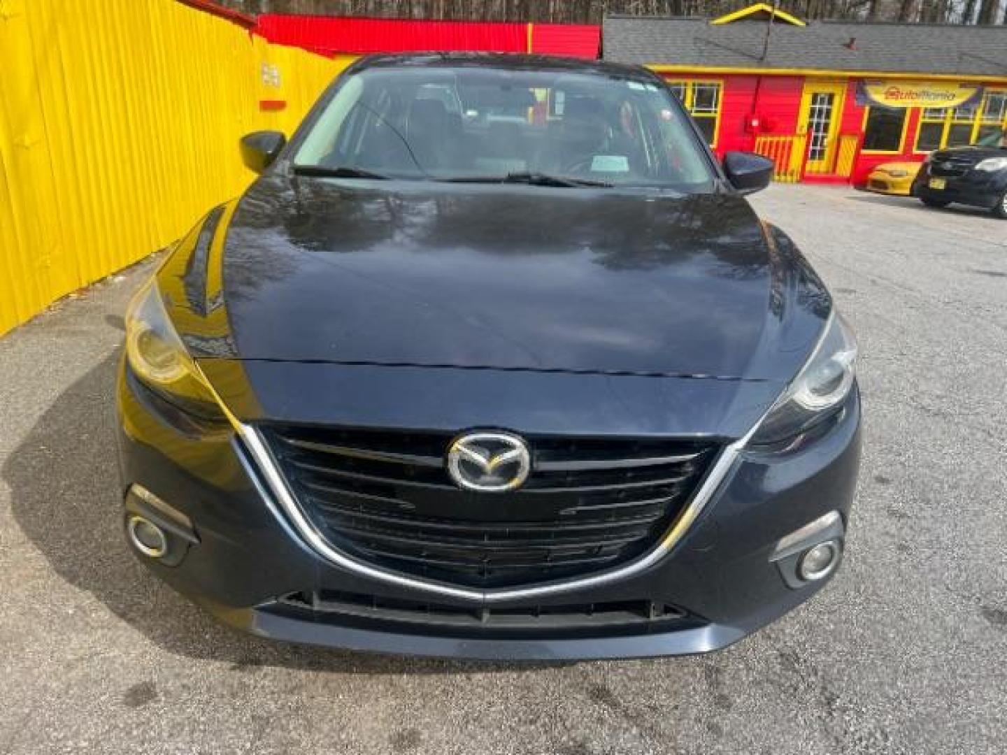 2014 Blue Mazda MAZDA3 s Touring AT 4-Door (JM1BM1V37E1) with an 2.5L L4 DOHC 16V engine, 6-Speed Automatic transmission, located at 1806 Veterans Memorial Hwy SW, Austell, GA, 30168, (770) 944-9558, 33.817959, -84.606987 - Photo#5