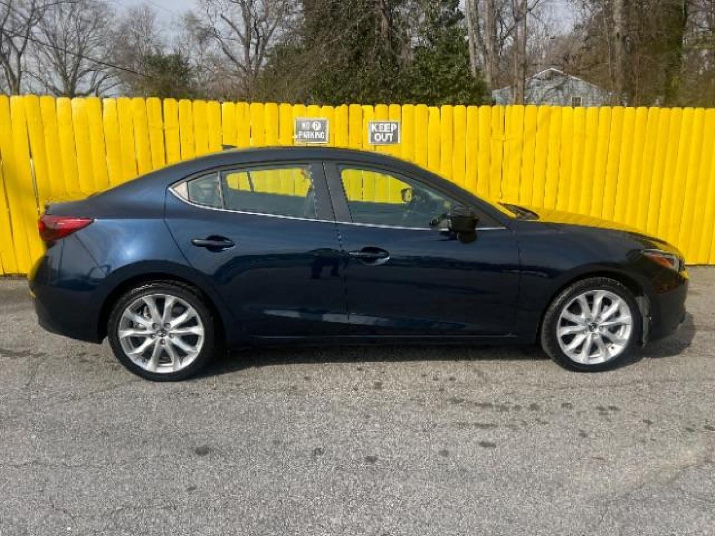 2014 Blue Mazda MAZDA3 s Touring AT 4-Door (JM1BM1V37E1) with an 2.5L L4 DOHC 16V engine, 6-Speed Automatic transmission, located at 1806 Veterans Memorial Hwy SW, Austell, GA, 30168, (770) 944-9558, 33.817959, -84.606987 - Photo#8