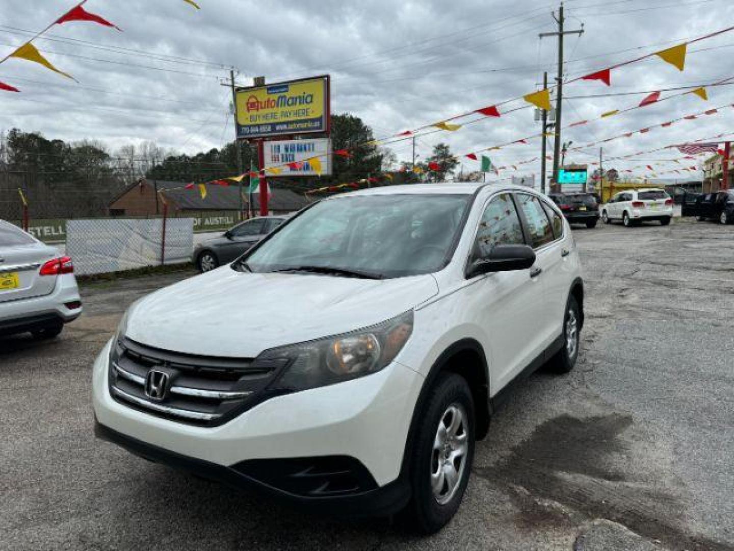 2014 White Honda CR-V LX 2WD 5-Speed AT (5J6RM3H38EL) with an 2.4L L4 DOHC 16V engine, 5-Speed Automatic transmission, located at 1806 Veterans Memorial Hwy SW, Austell, GA, 30168, (770) 944-9558, 33.817959, -84.606987 - Photo#0