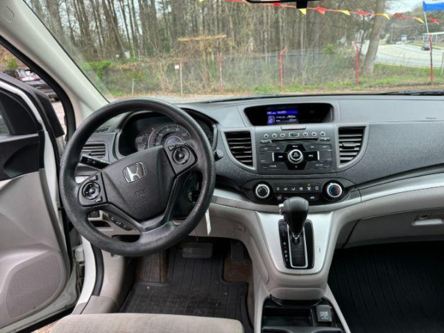 2014 White Honda CR-V LX 2WD 5-Speed AT (5J6RM3H38EL) with an 2.4L L4 DOHC 16V engine, 5-Speed Automatic transmission, located at 1806 Veterans Memorial Hwy SW, Austell, GA, 30168, (770) 944-9558, 33.817959, -84.606987 - Photo#13