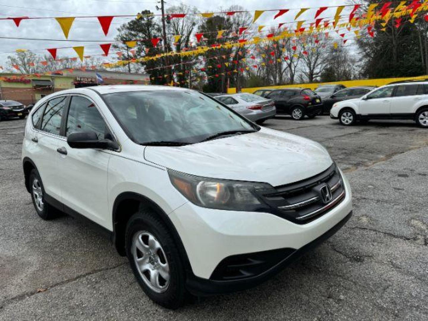 2014 White Honda CR-V LX 2WD 5-Speed AT (5J6RM3H38EL) with an 2.4L L4 DOHC 16V engine, 5-Speed Automatic transmission, located at 1806 Veterans Memorial Hwy SW, Austell, GA, 30168, (770) 944-9558, 33.817959, -84.606987 - Photo#3