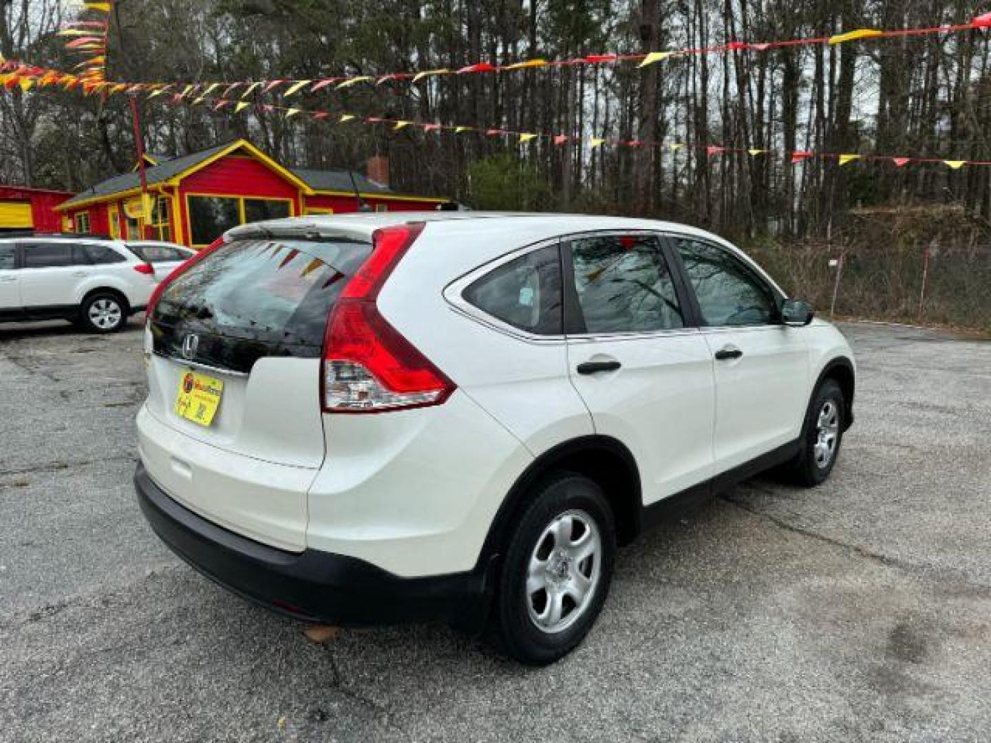 2014 White Honda CR-V LX 2WD 5-Speed AT (5J6RM3H38EL) with an 2.4L L4 DOHC 16V engine, 5-Speed Automatic transmission, located at 1806 Veterans Memorial Hwy SW, Austell, GA, 30168, (770) 944-9558, 33.817959, -84.606987 - Photo#4