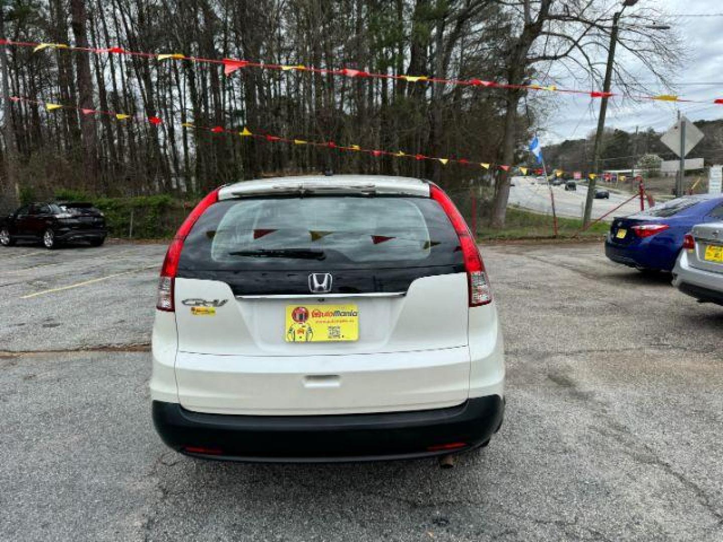 2014 White Honda CR-V LX 2WD 5-Speed AT (5J6RM3H38EL) with an 2.4L L4 DOHC 16V engine, 5-Speed Automatic transmission, located at 1806 Veterans Memorial Hwy SW, Austell, GA, 30168, (770) 944-9558, 33.817959, -84.606987 - Photo#5